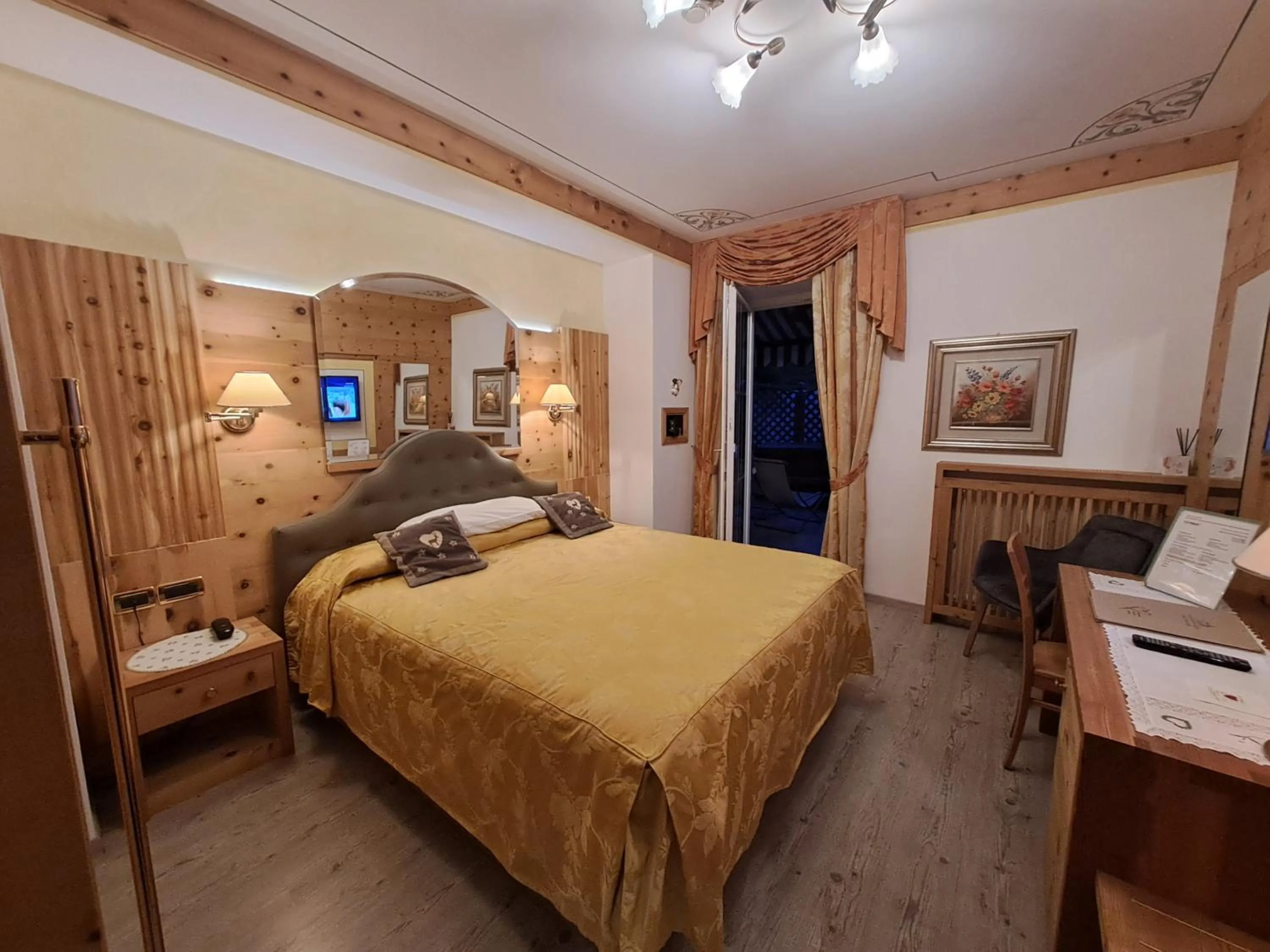 Bed in Alexander Hotel Alpine Wellness Dolomites