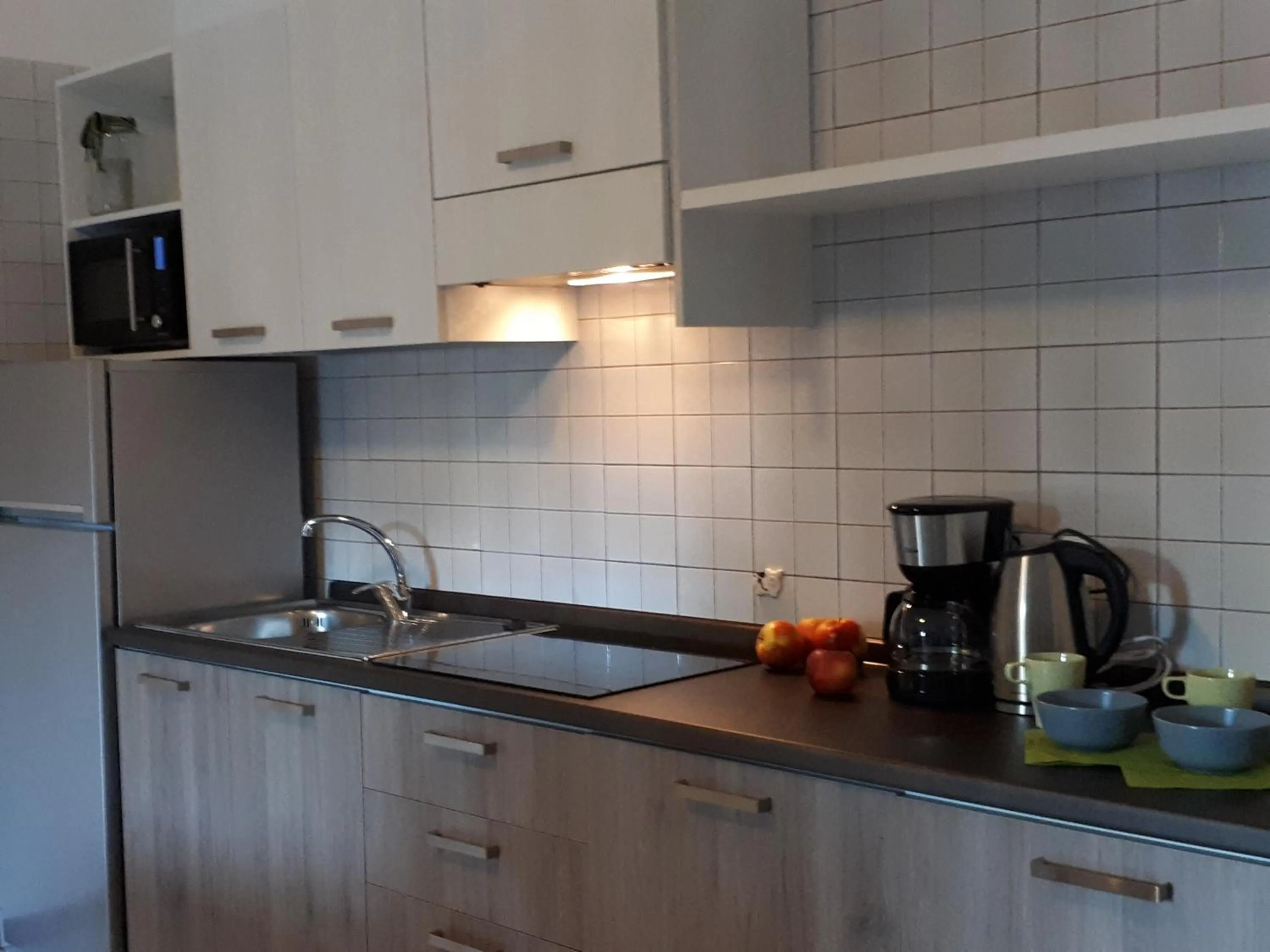Kitchen or kitchenette in 3MÙZEN apartments