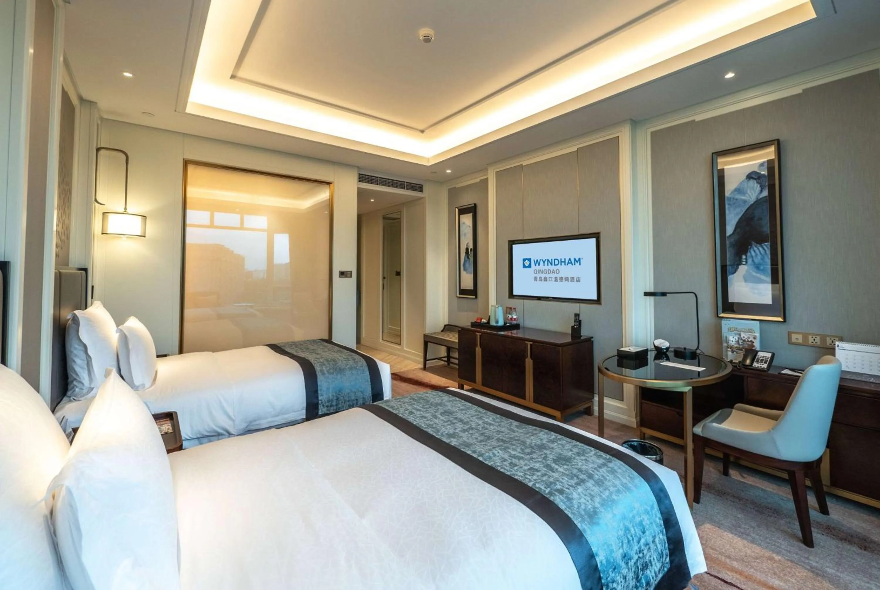 Photo of the whole room, Bed in Wyndham Qingdao l Free Fixed-Time Shuttle Service Between Hotel and Airport & North Railway Station l Outdoor Children's Amusement Park l 1-Hour Play Snooker or Table Tennis