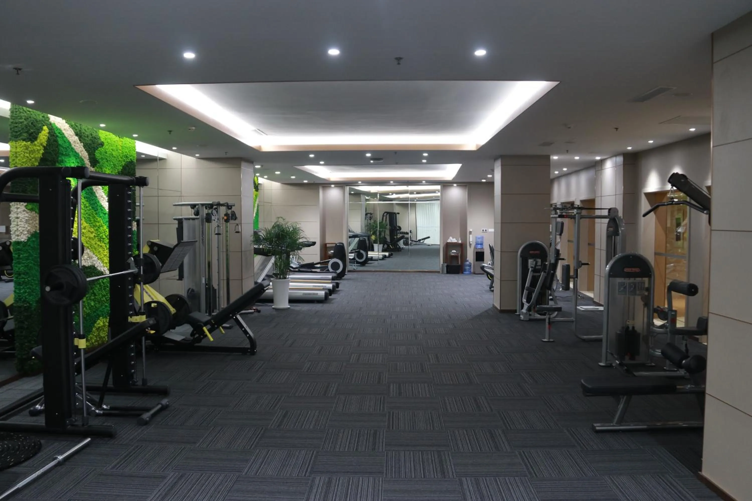 Fitness centre/facilities in Wyndham Qingdao l Free Fixed-Time Shuttle Service Between Hotel and Airport & North Railway Station l Outdoor Children's Amusement Park l 1-Hour Play Snooker or Table Tennis