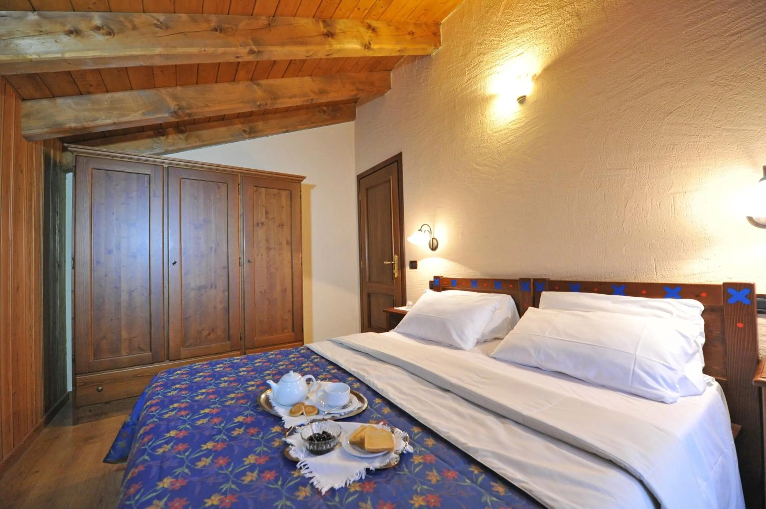 Bedroom, Bed in Family Apartments Le Chalet