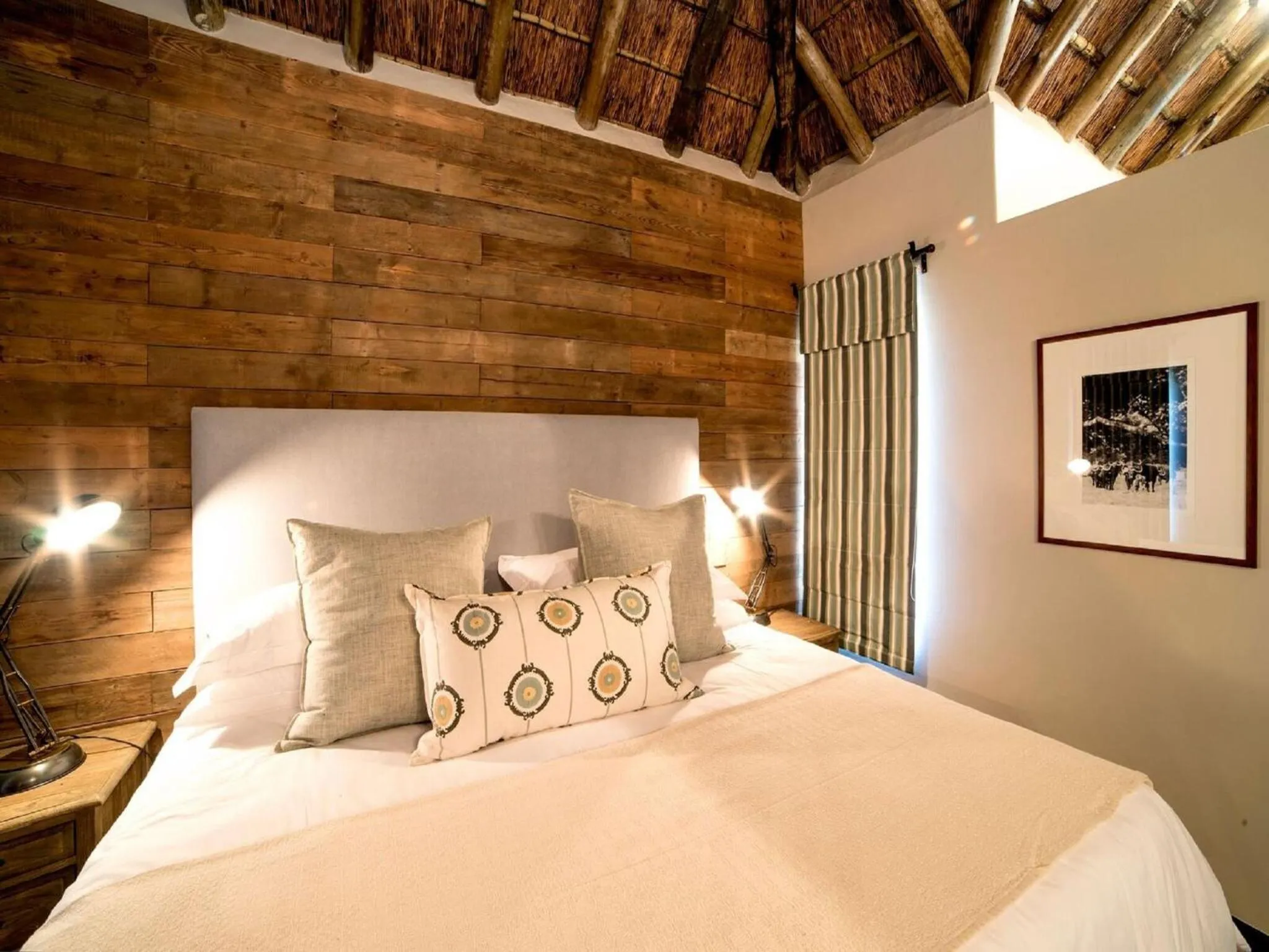 Bed in Burlington Bush Cottages by The Oyster Collection