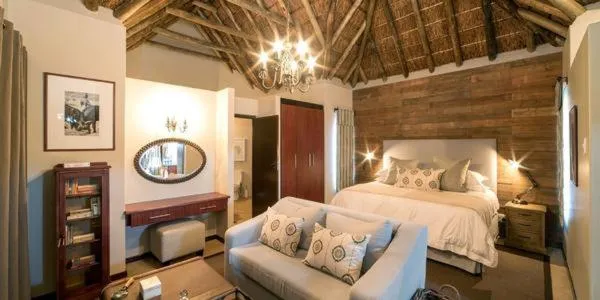 Bed in Burlington Bush Cottages by The Oyster Collection