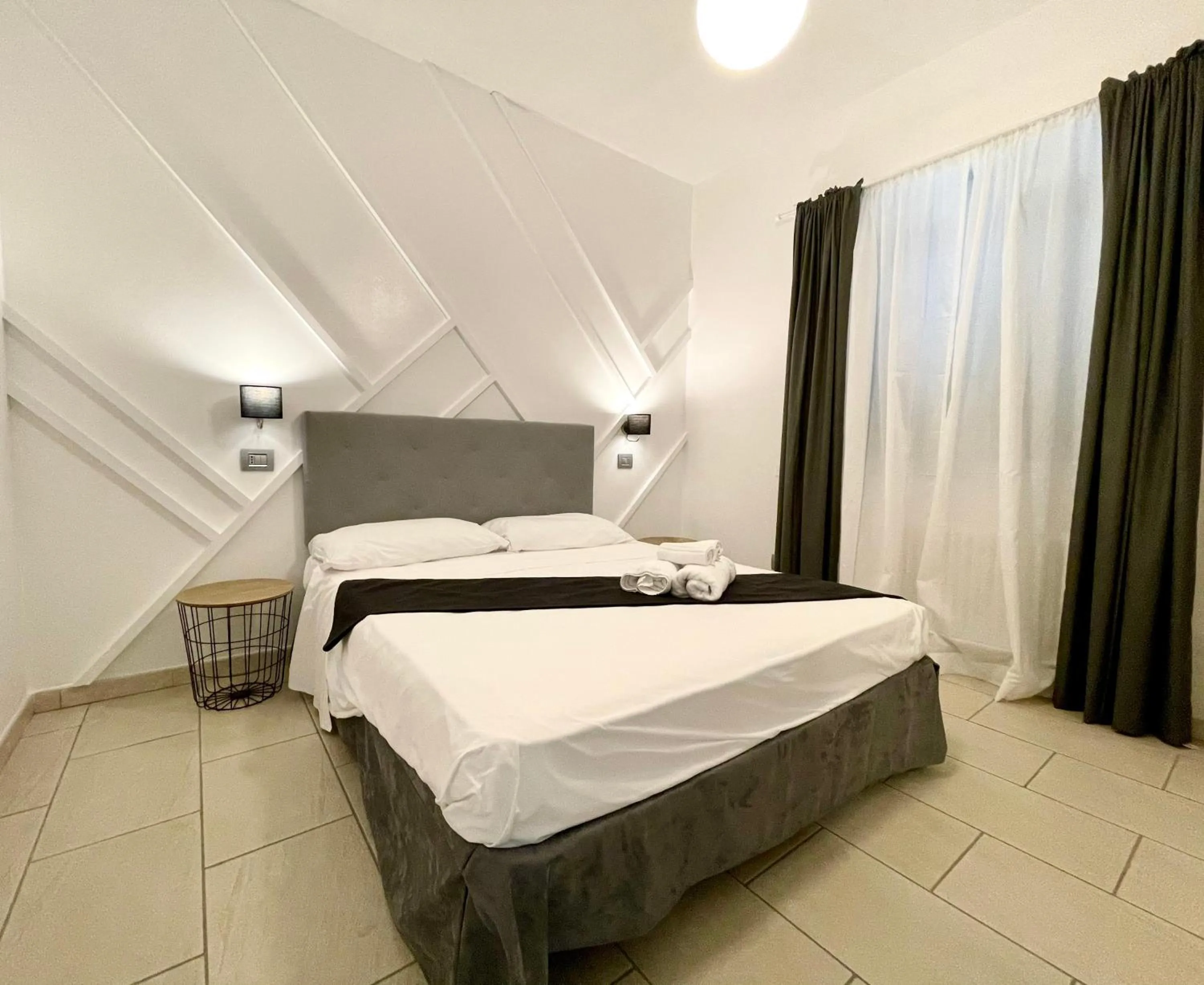 Bed in Le Village Sarzana