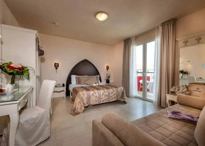 Bed in Baia del Mar Beach Boutique Hotel