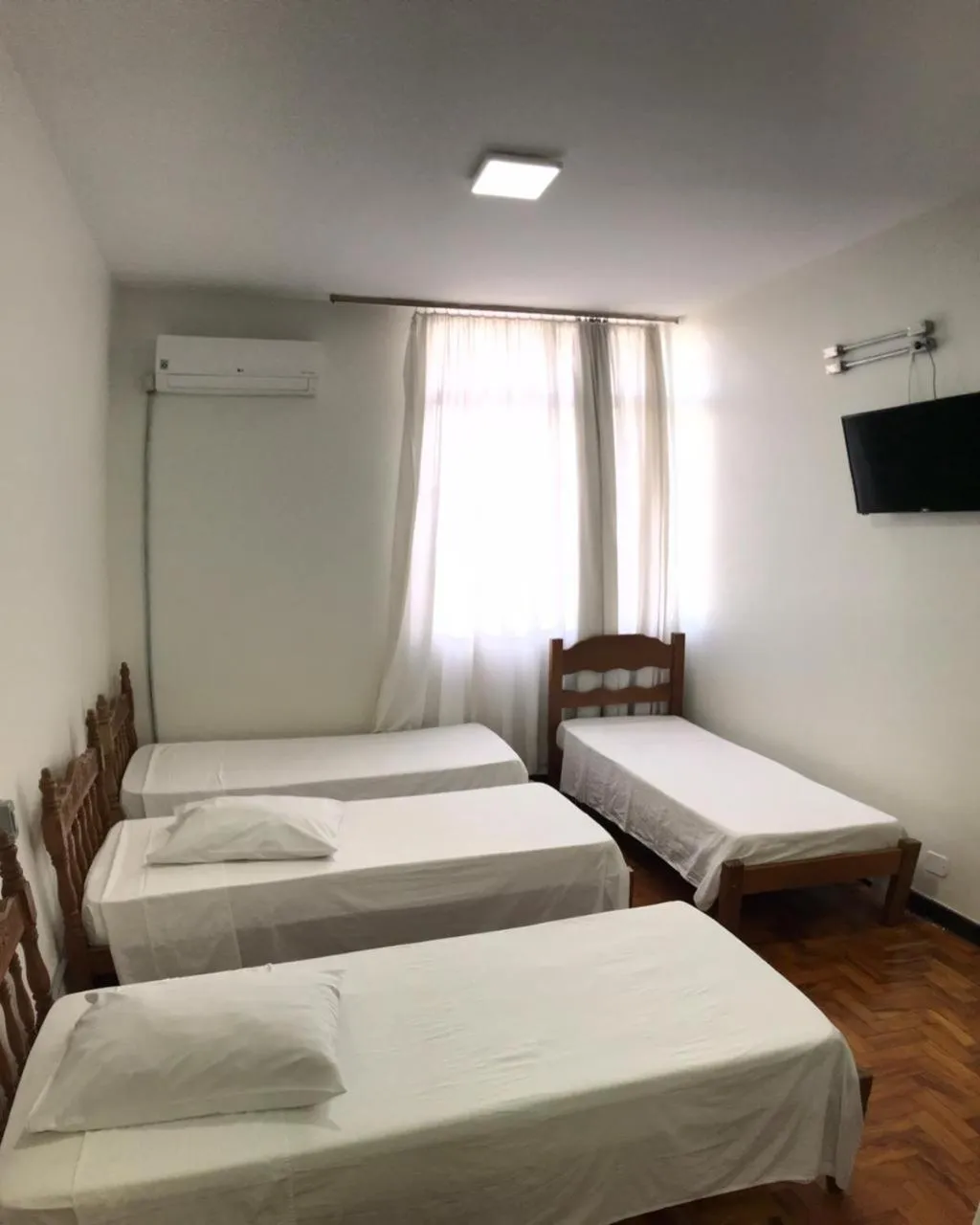 Bed in Hotel Sao Nicolau