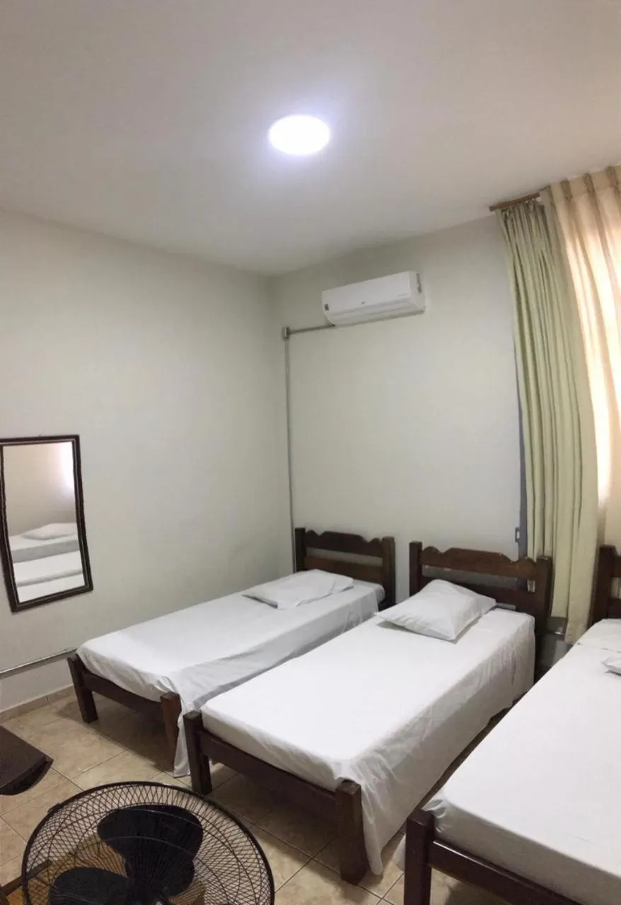 Bed in Hotel Sao Nicolau