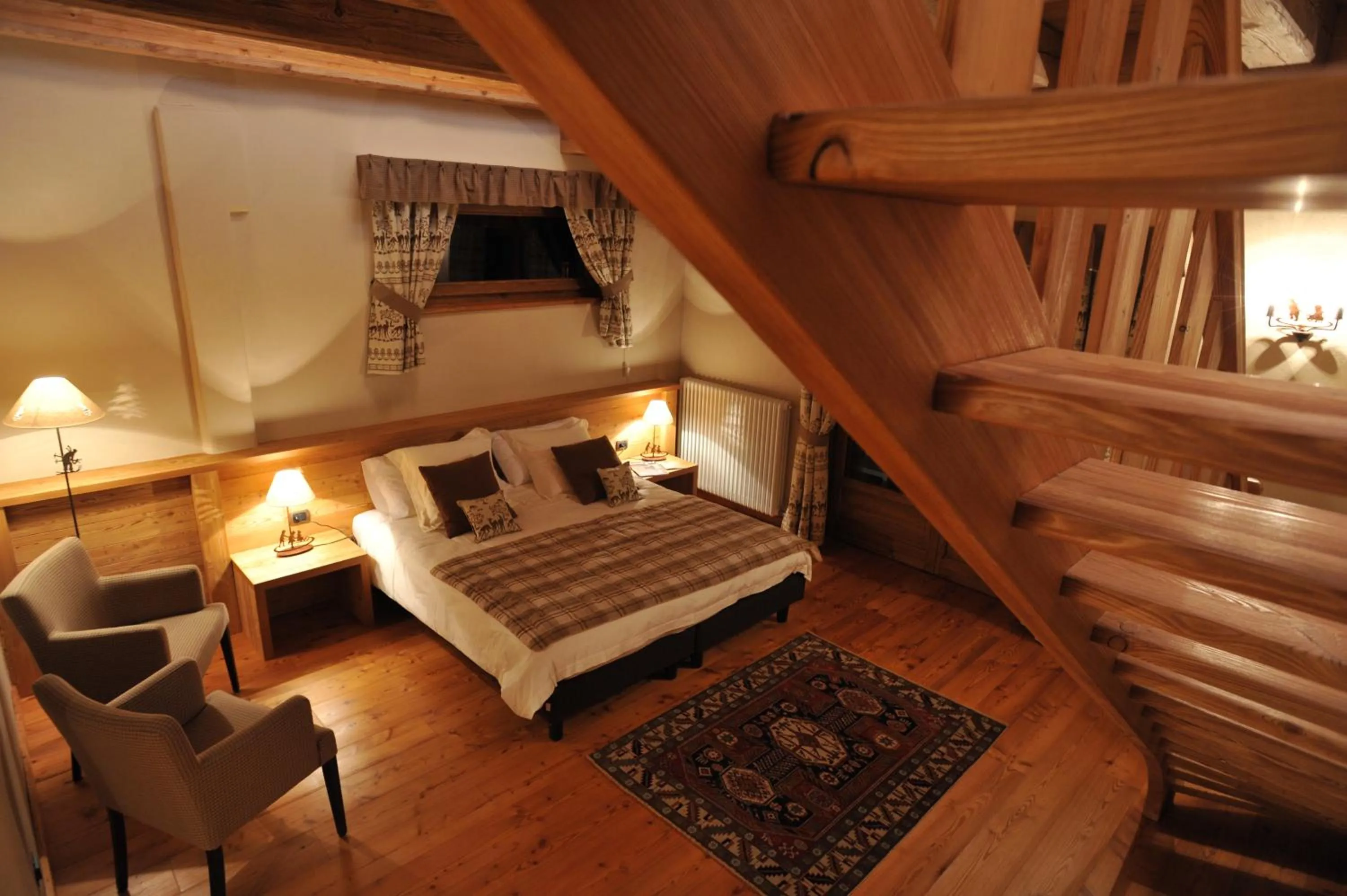 Photo of the whole room, Bed in La Madonnina Del Gran Paradiso Wellness Hotel