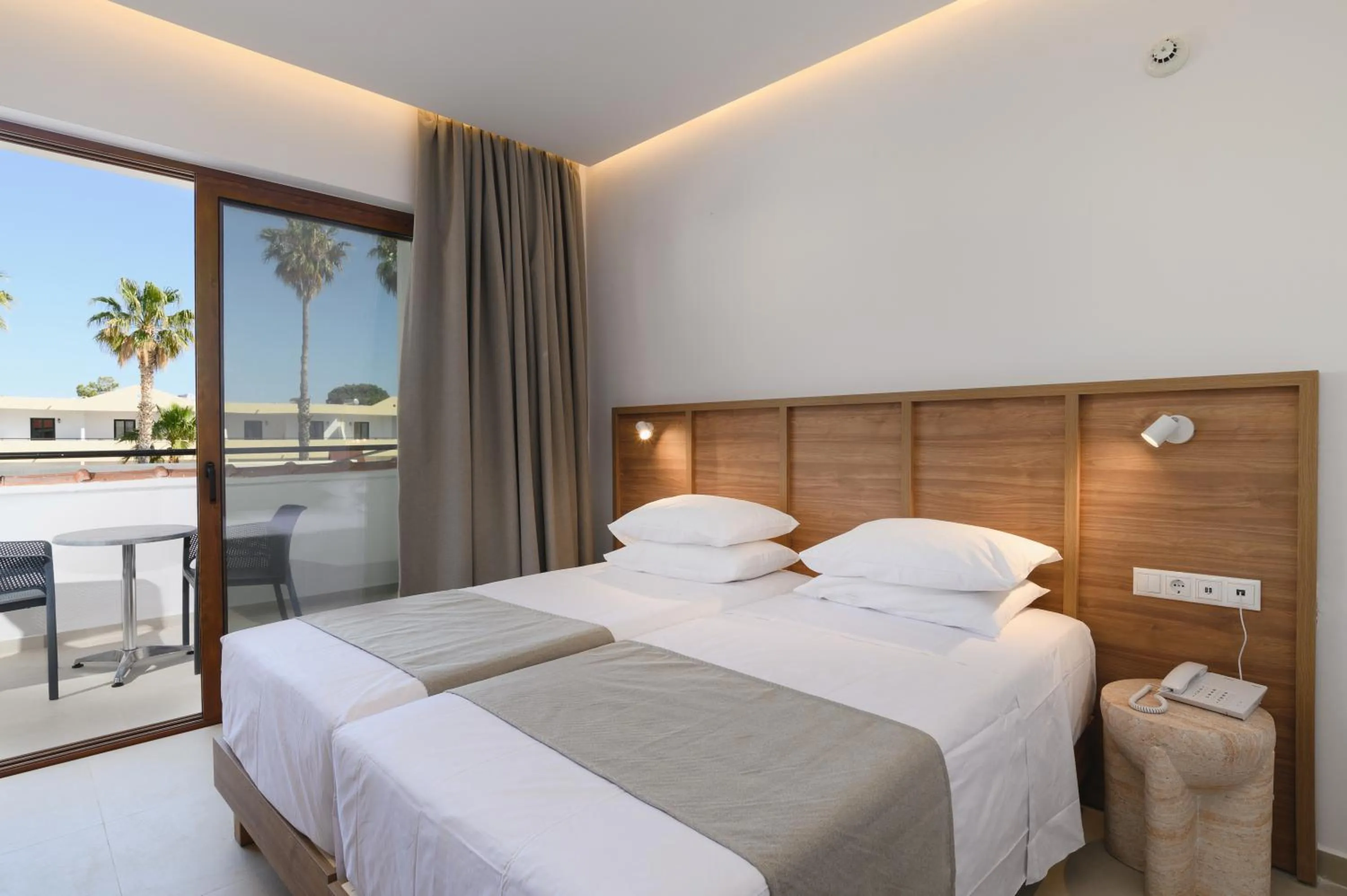 Bed in Pefkos Village Resort