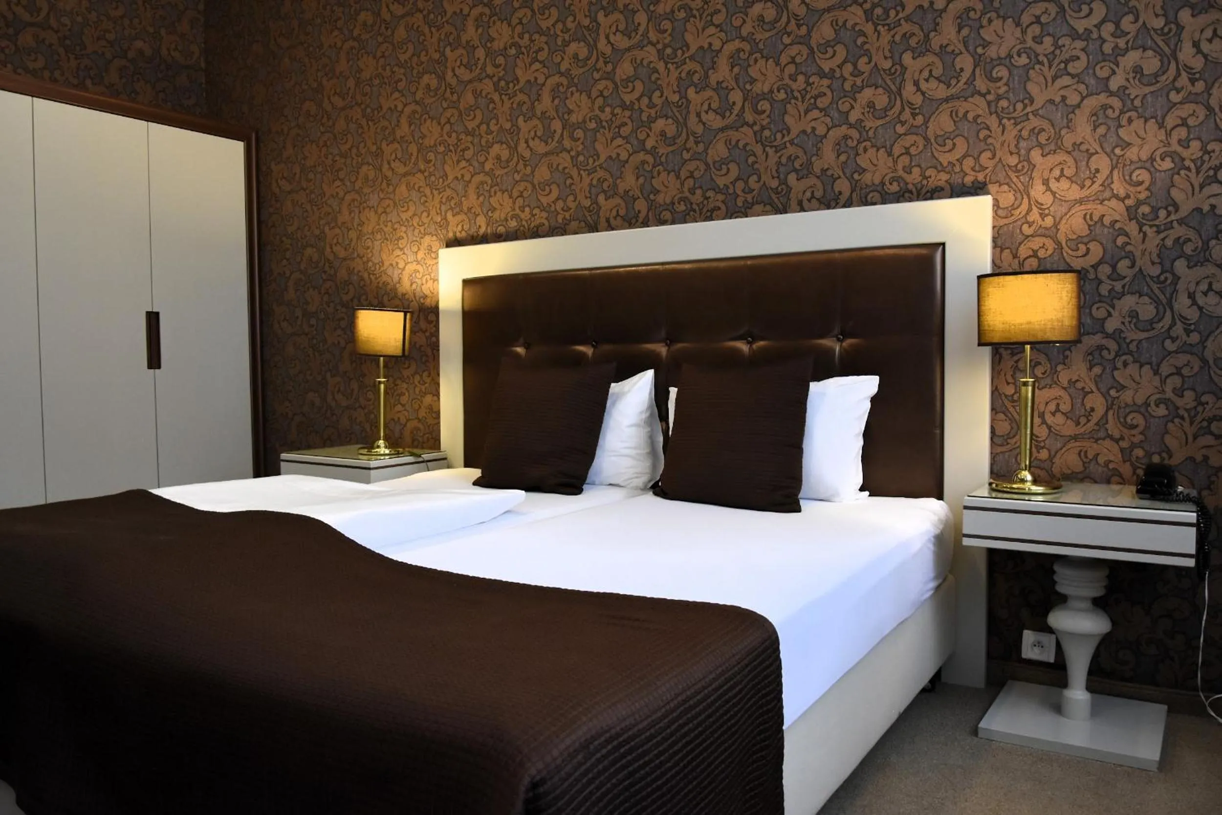 Bed in Promenáda Romantic Hotel