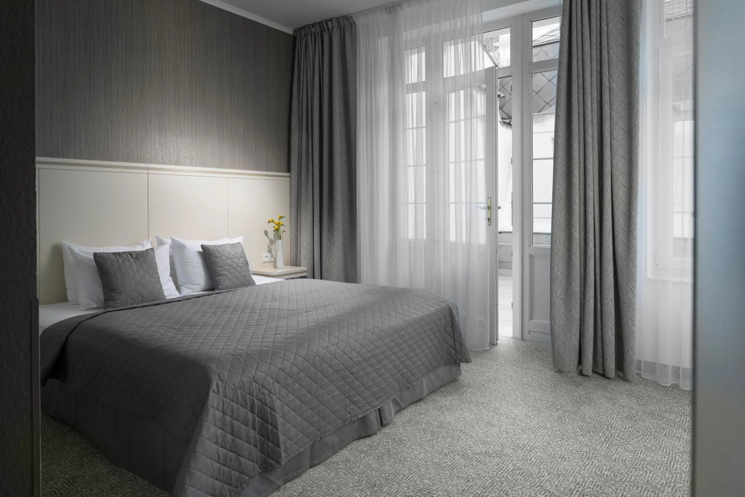 Photo of the whole room, Bed in Promenáda Romantic Hotel