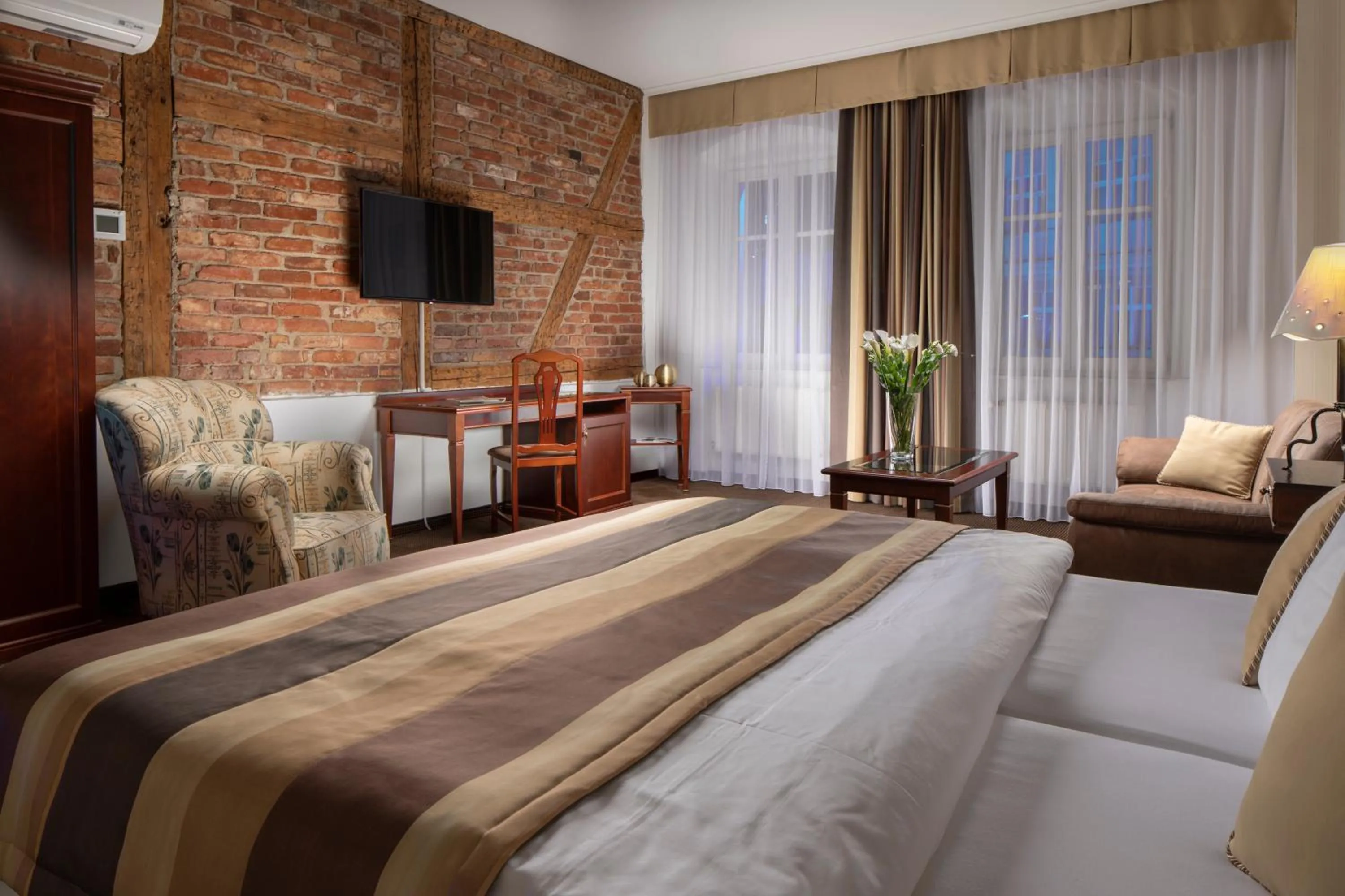 Photo of the whole room, Bed in Promenáda Romantic Hotel