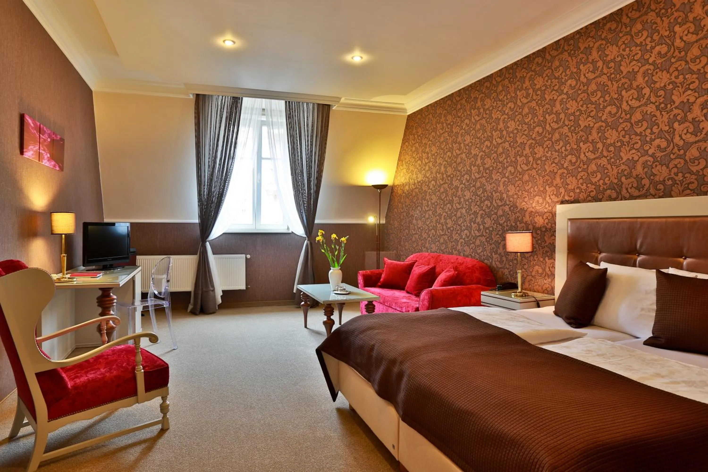 Bed in Promenáda Romantic Hotel