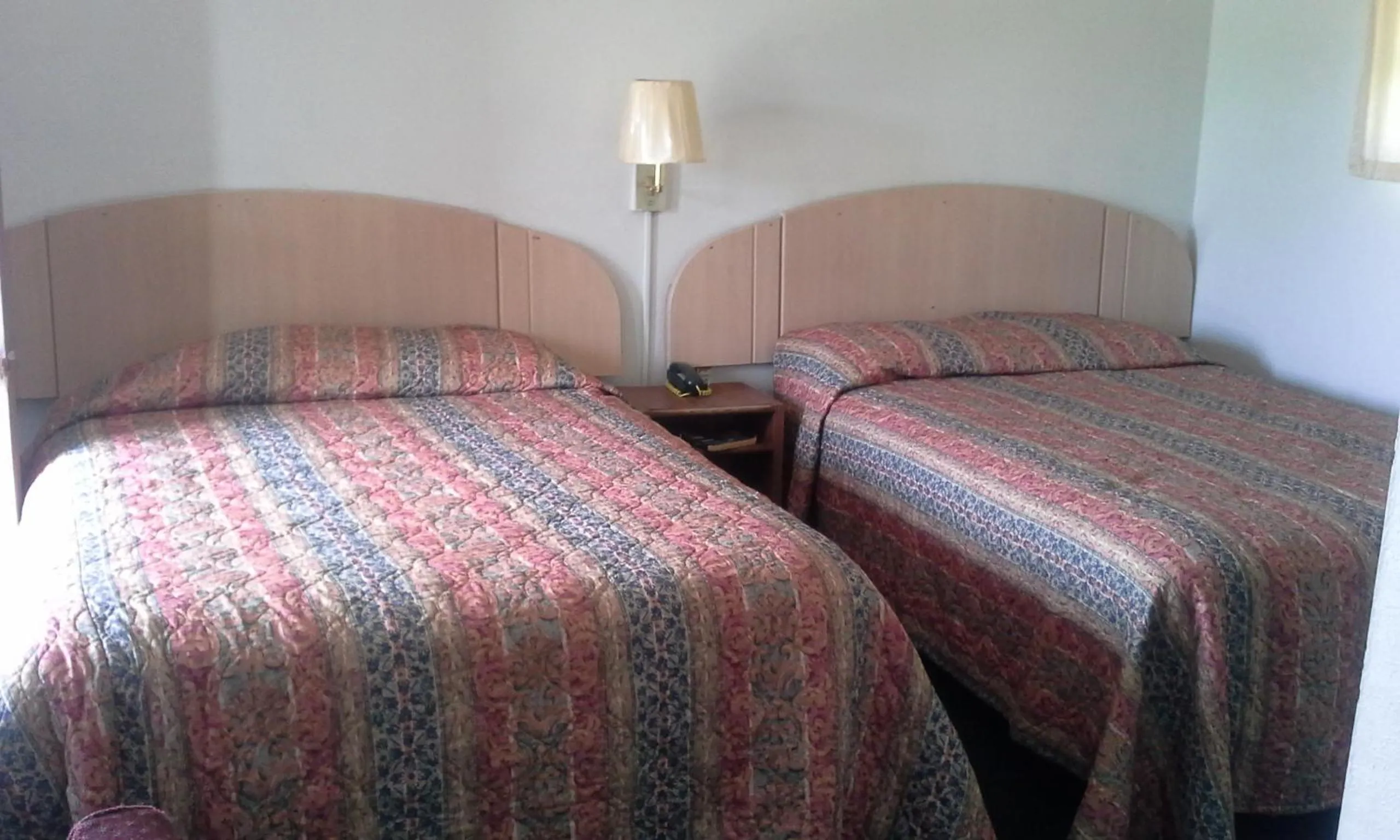 Bed in Relax Inn Ranger