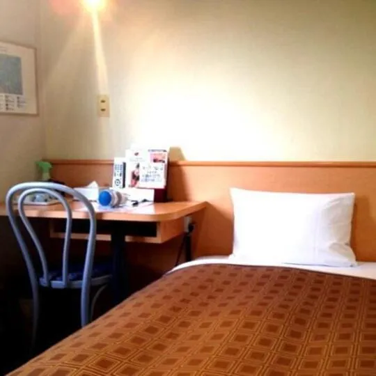 Bed in Takasaki Ekimae Plaza Hotel