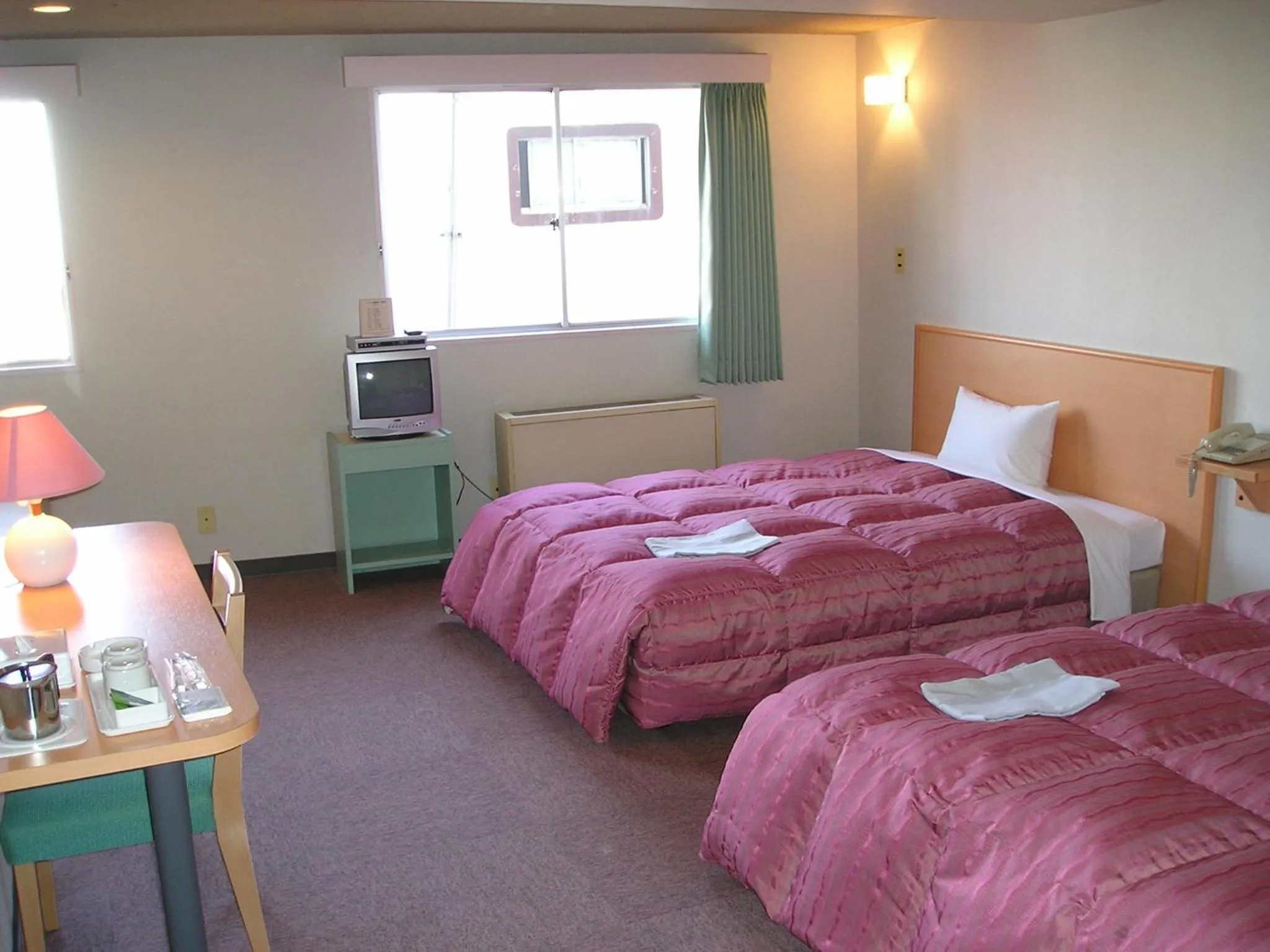 Bed in Takasaki Ekimae Plaza Hotel