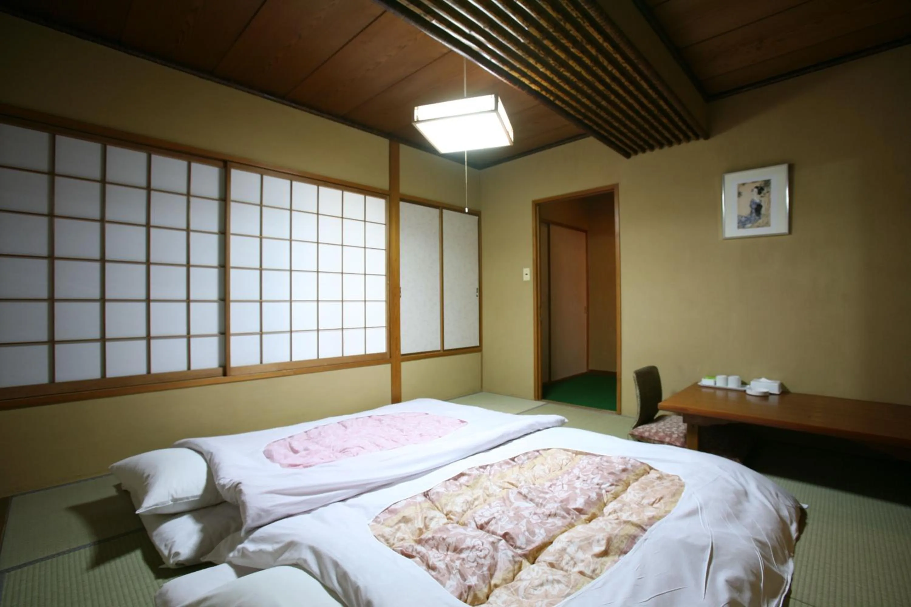 Bed in Takasaki Ekimae Plaza Hotel