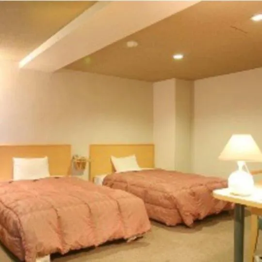 Bed in Takasaki Ekimae Plaza Hotel