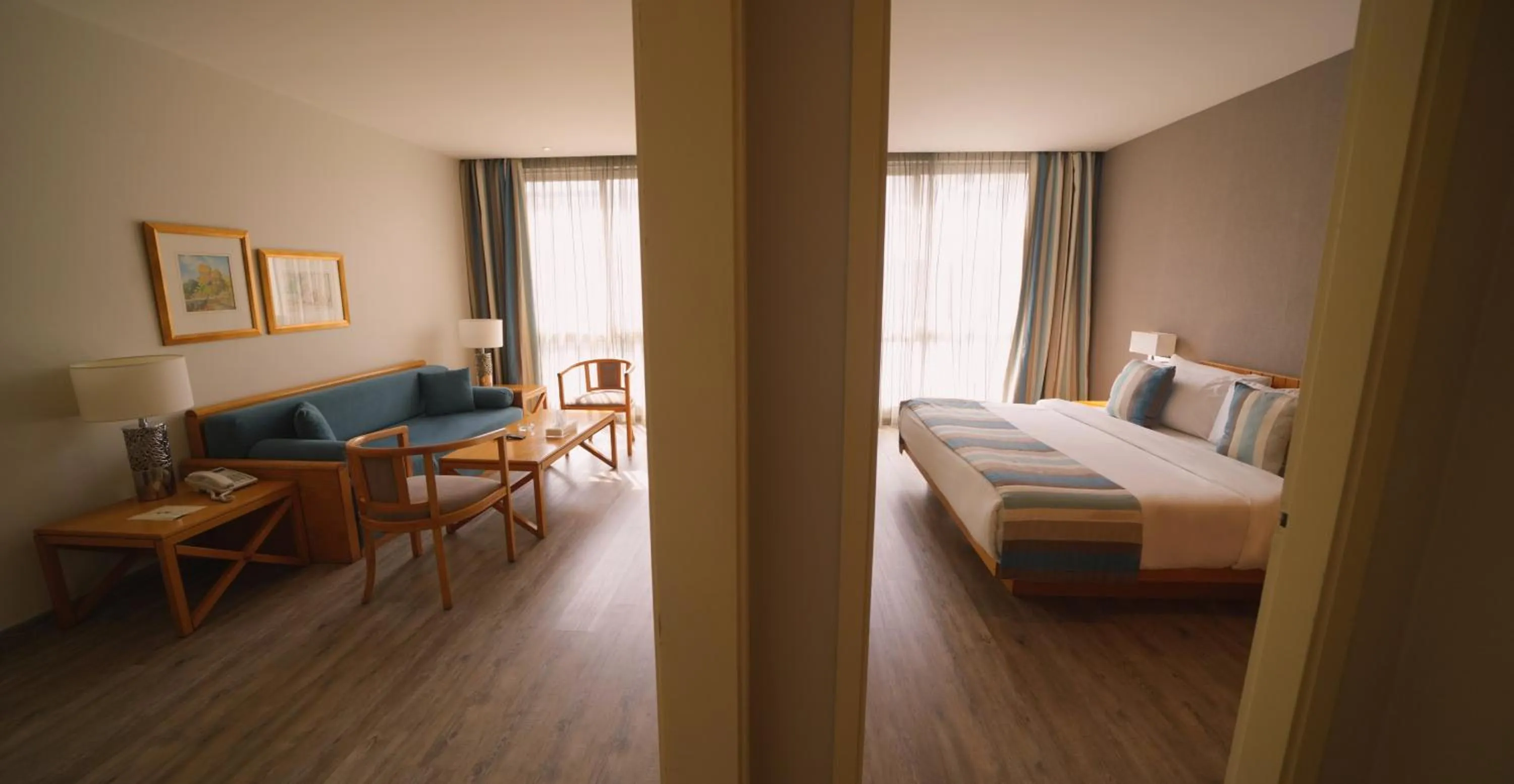 Living room, Bed in Casa D'or Hotel