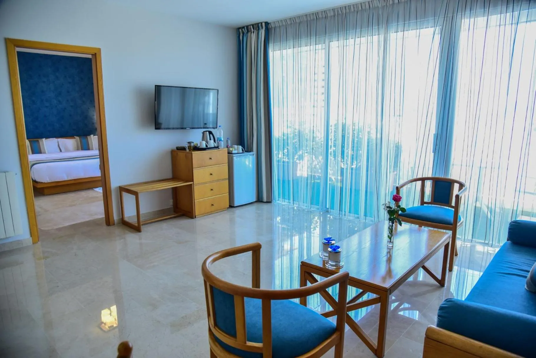 Living room, Bed in Casa D'or Hotel