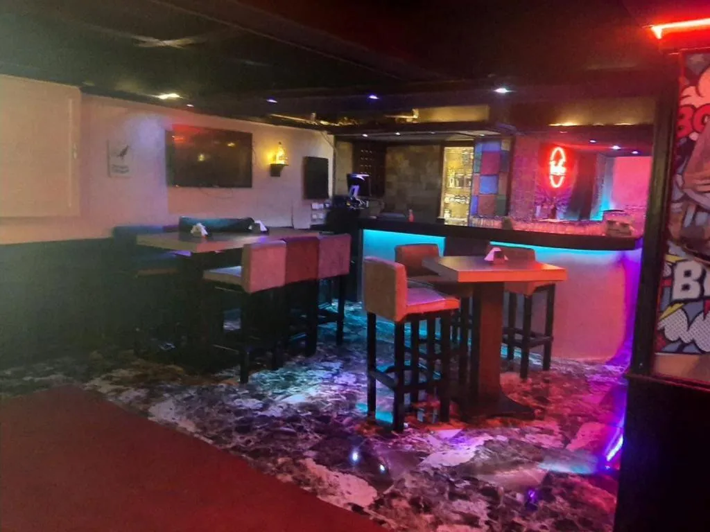 Communal lounge/ TV room in Zayed Hotel