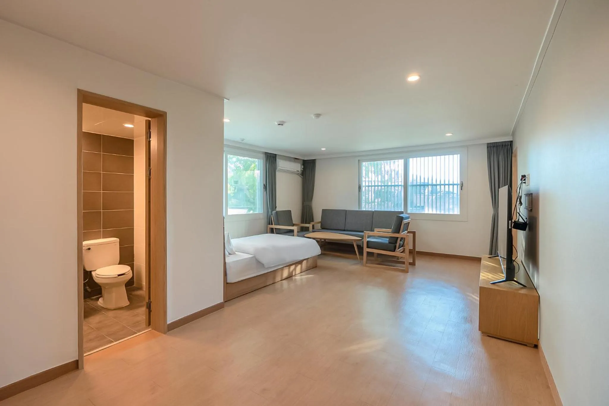 Bed in Heyy Seogwipo Hotel