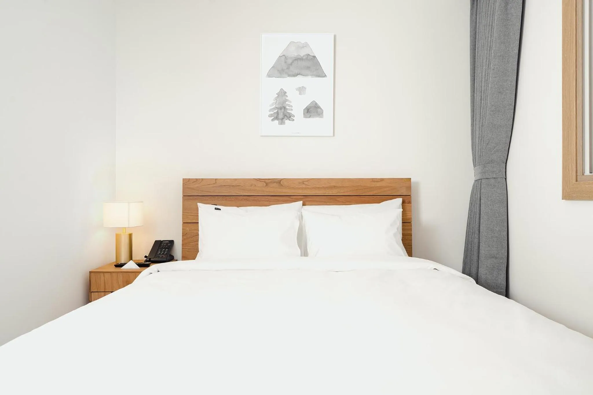 Bed in Heyy Seogwipo Hotel