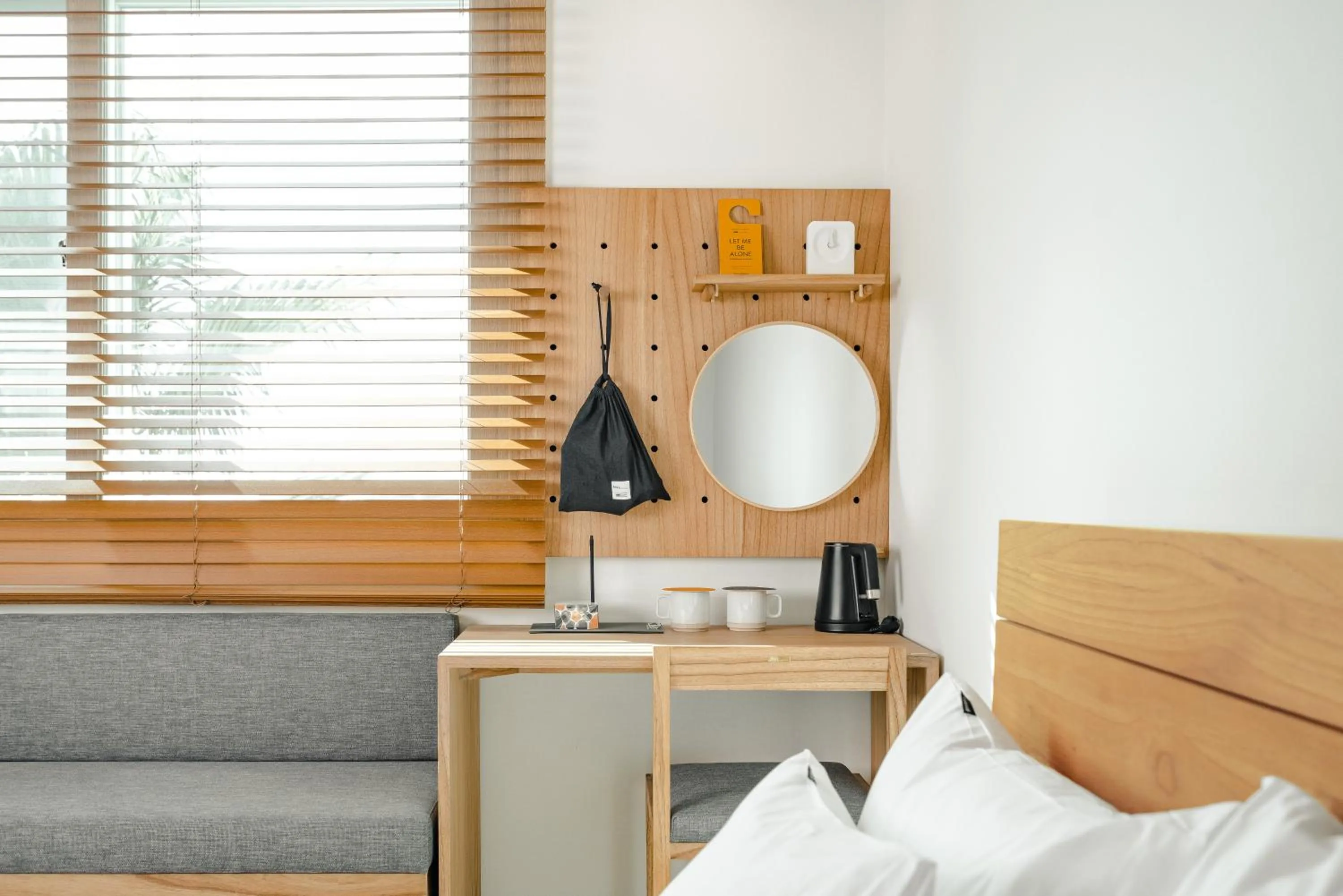 Seating area, Bed in Heyy Seogwipo Hotel