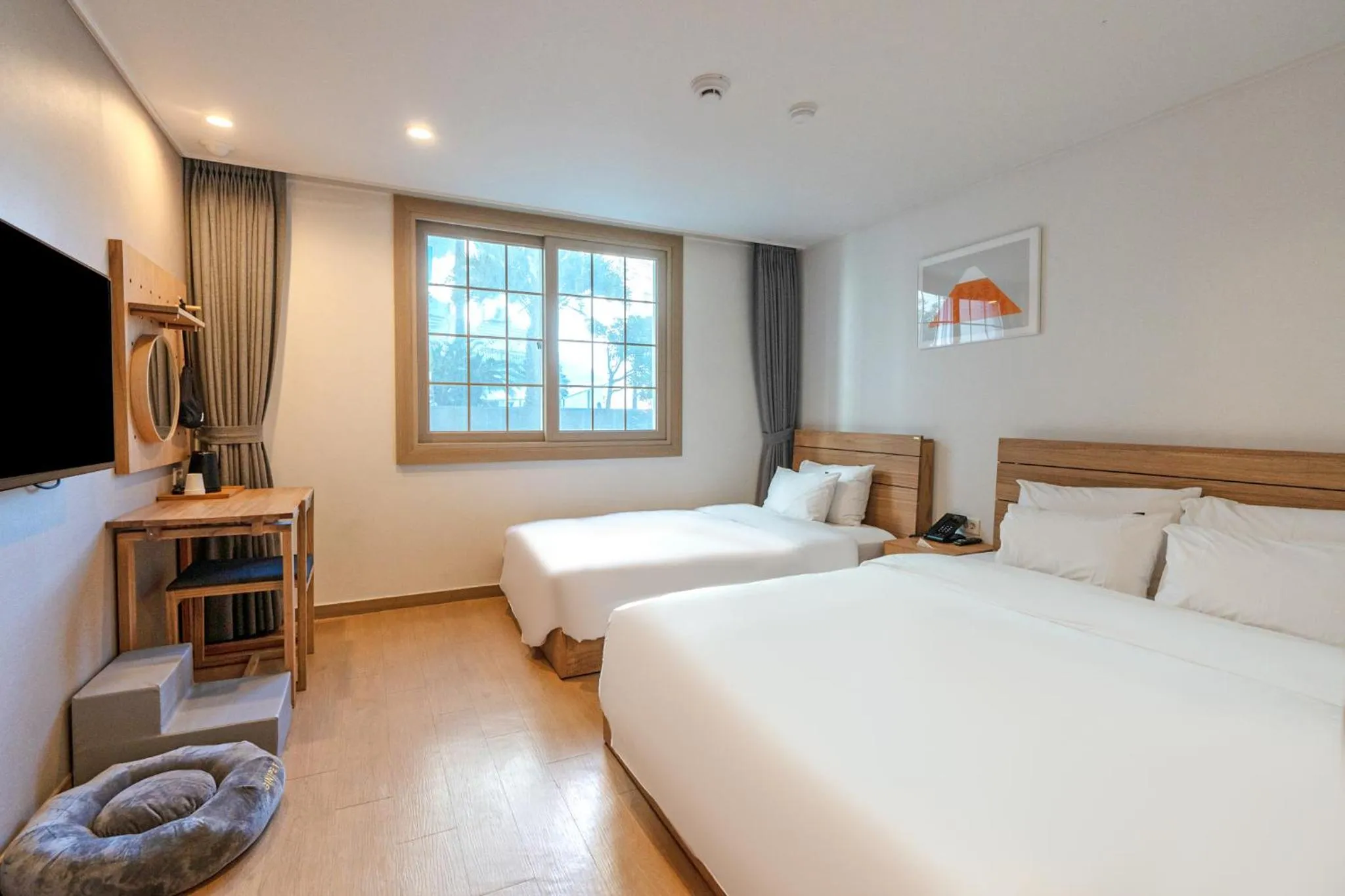 Bed in Heyy Seogwipo Hotel