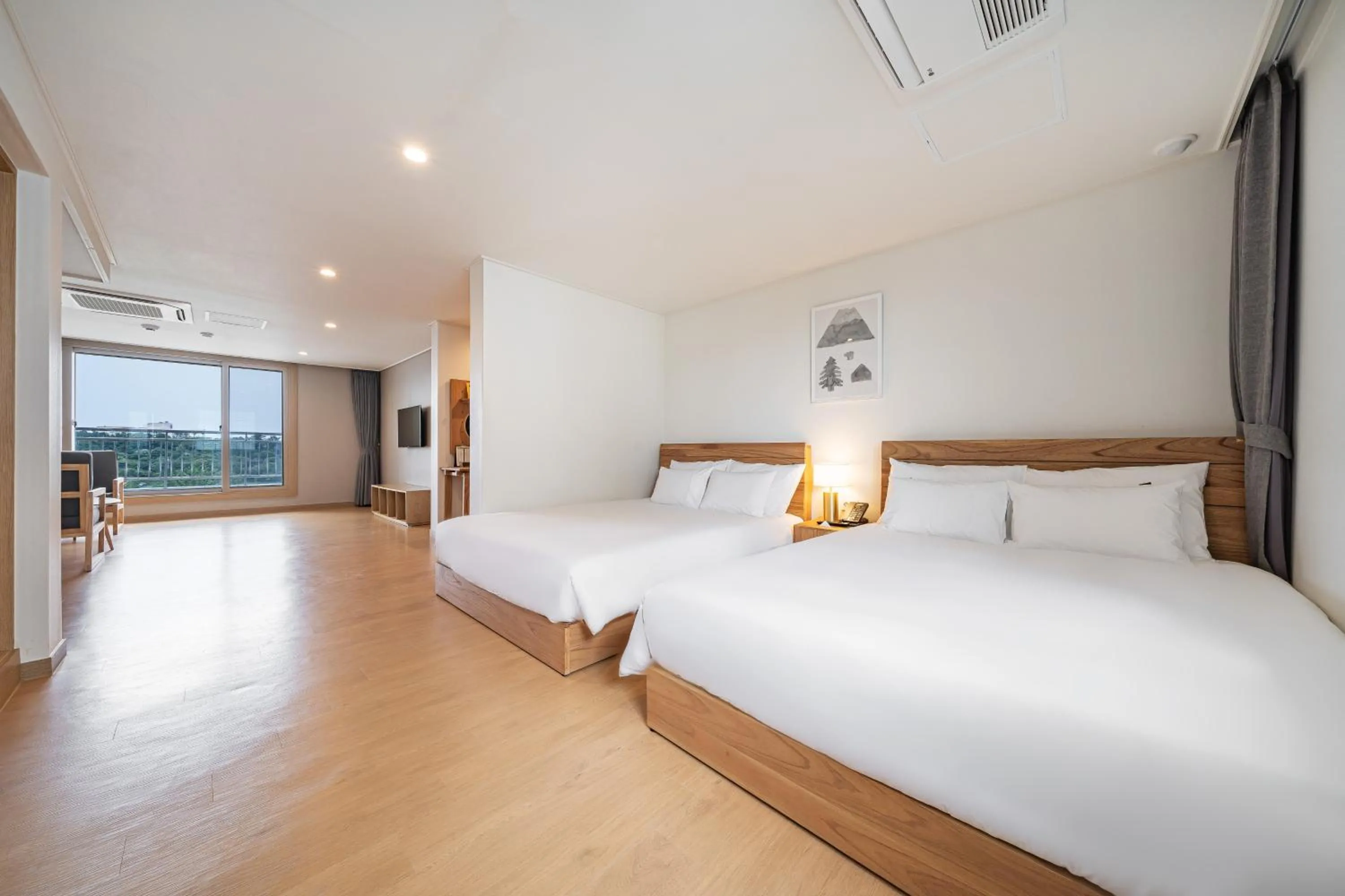 Bed in Heyy Seogwipo Hotel