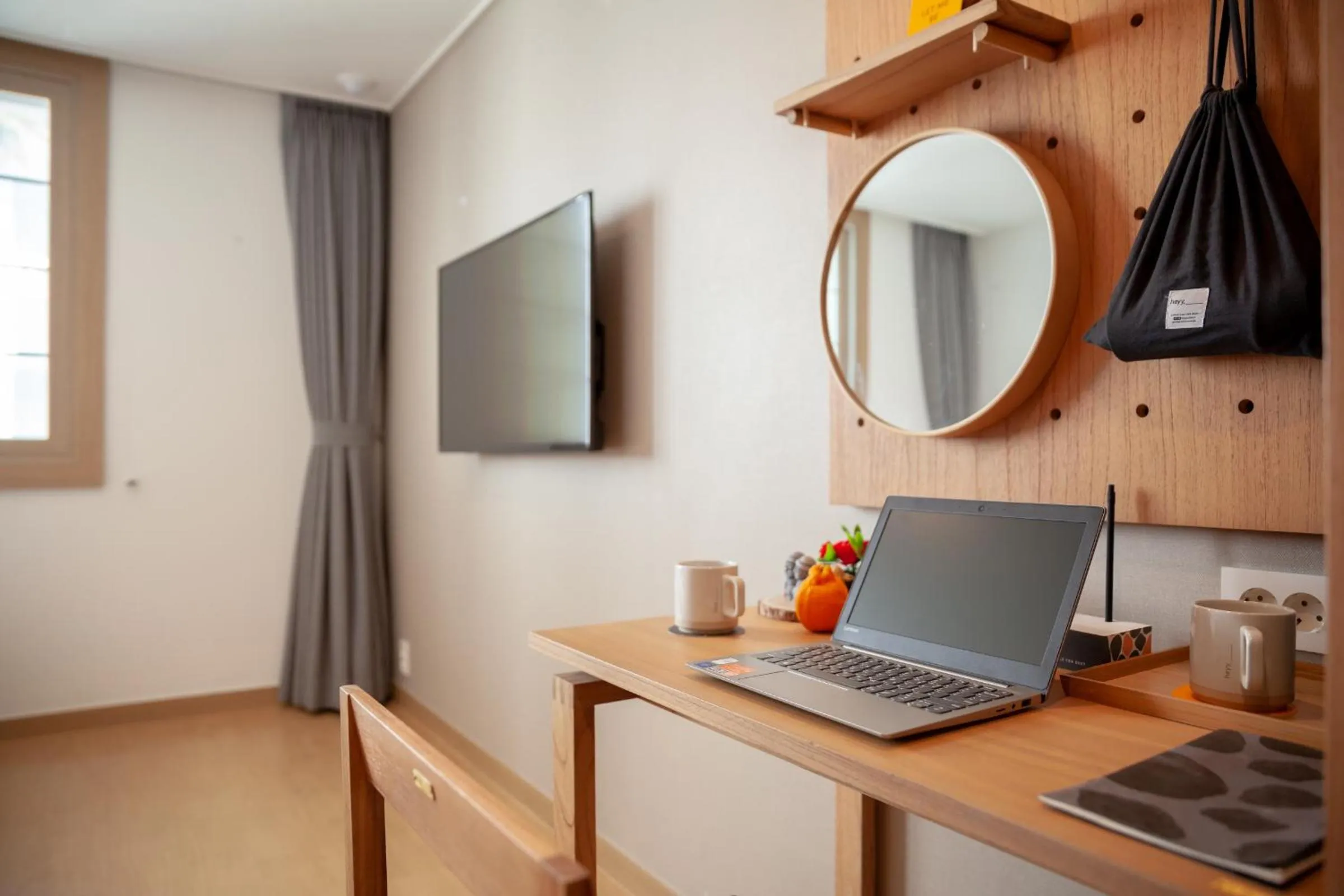 TV and multimedia in Heyy Seogwipo Hotel