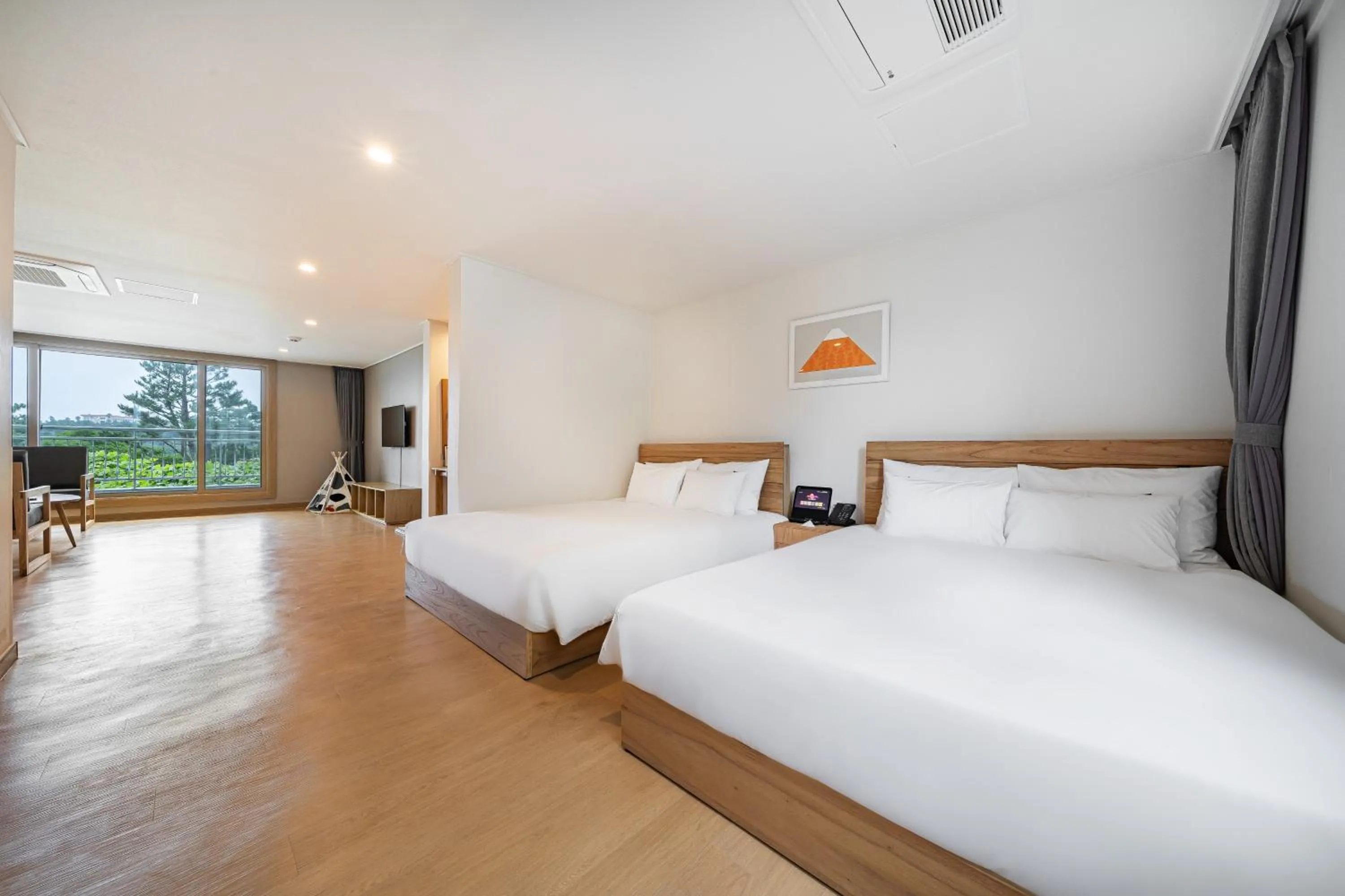 Bed in Heyy Seogwipo Hotel