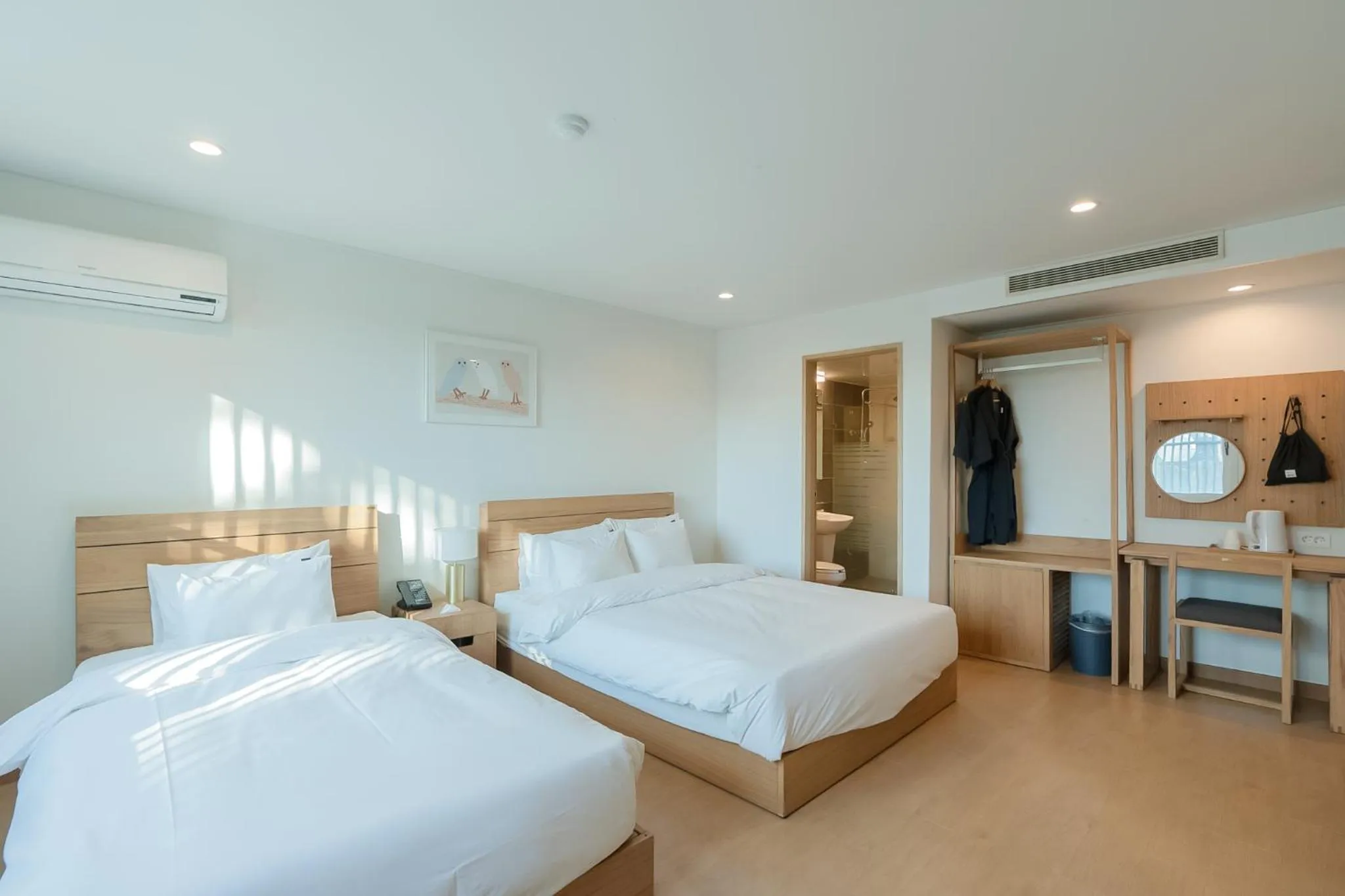 Bed in Heyy Seogwipo Hotel