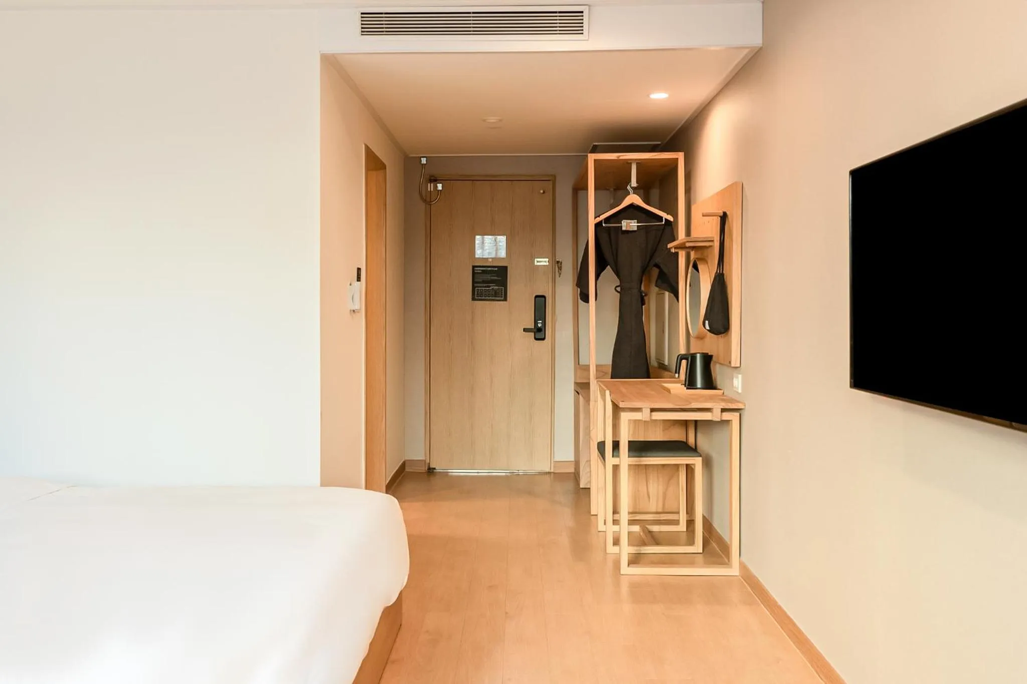 Bed in Heyy Seogwipo Hotel