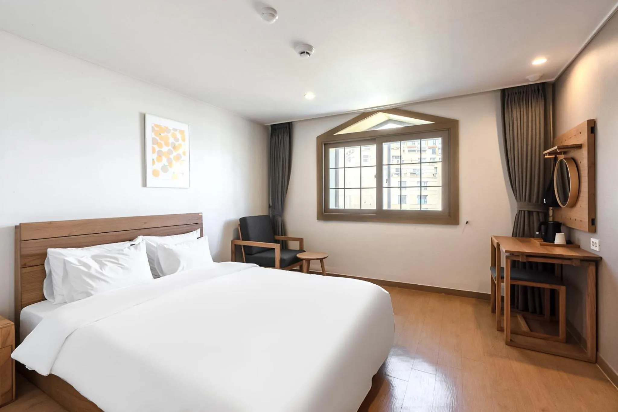 Bed in Heyy Seogwipo Hotel