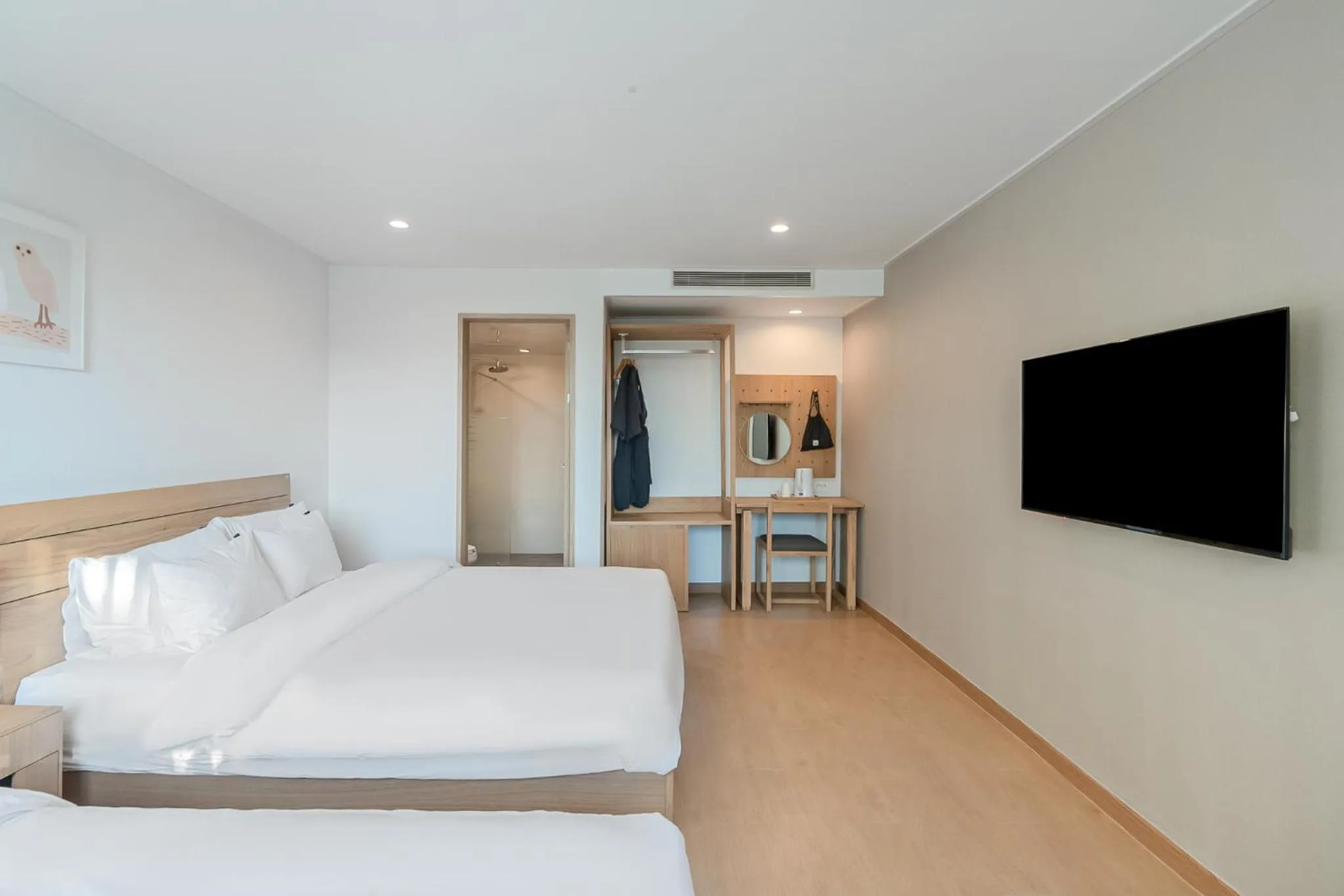 Bed in Heyy Seogwipo Hotel