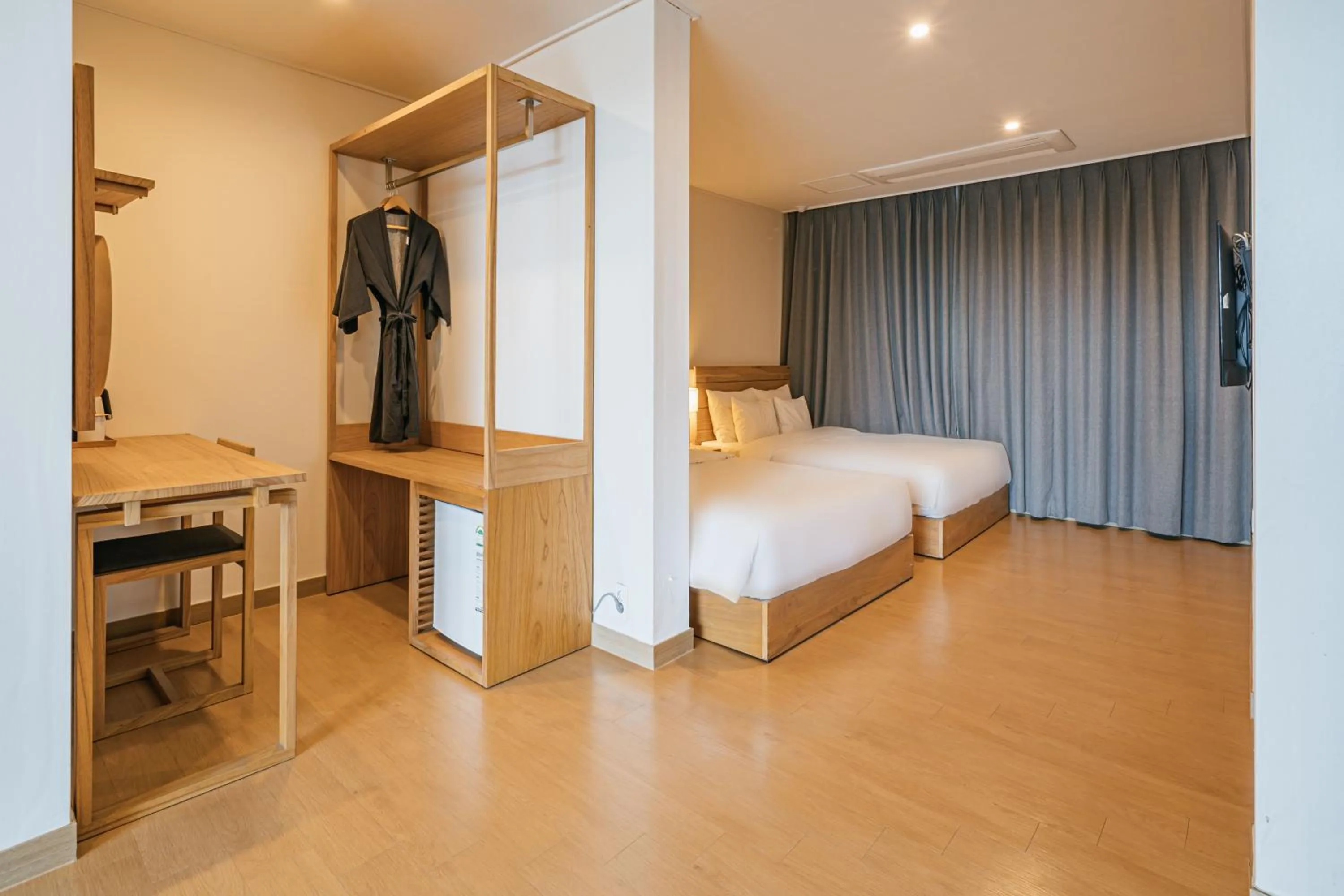 Bed in Heyy Seogwipo Hotel