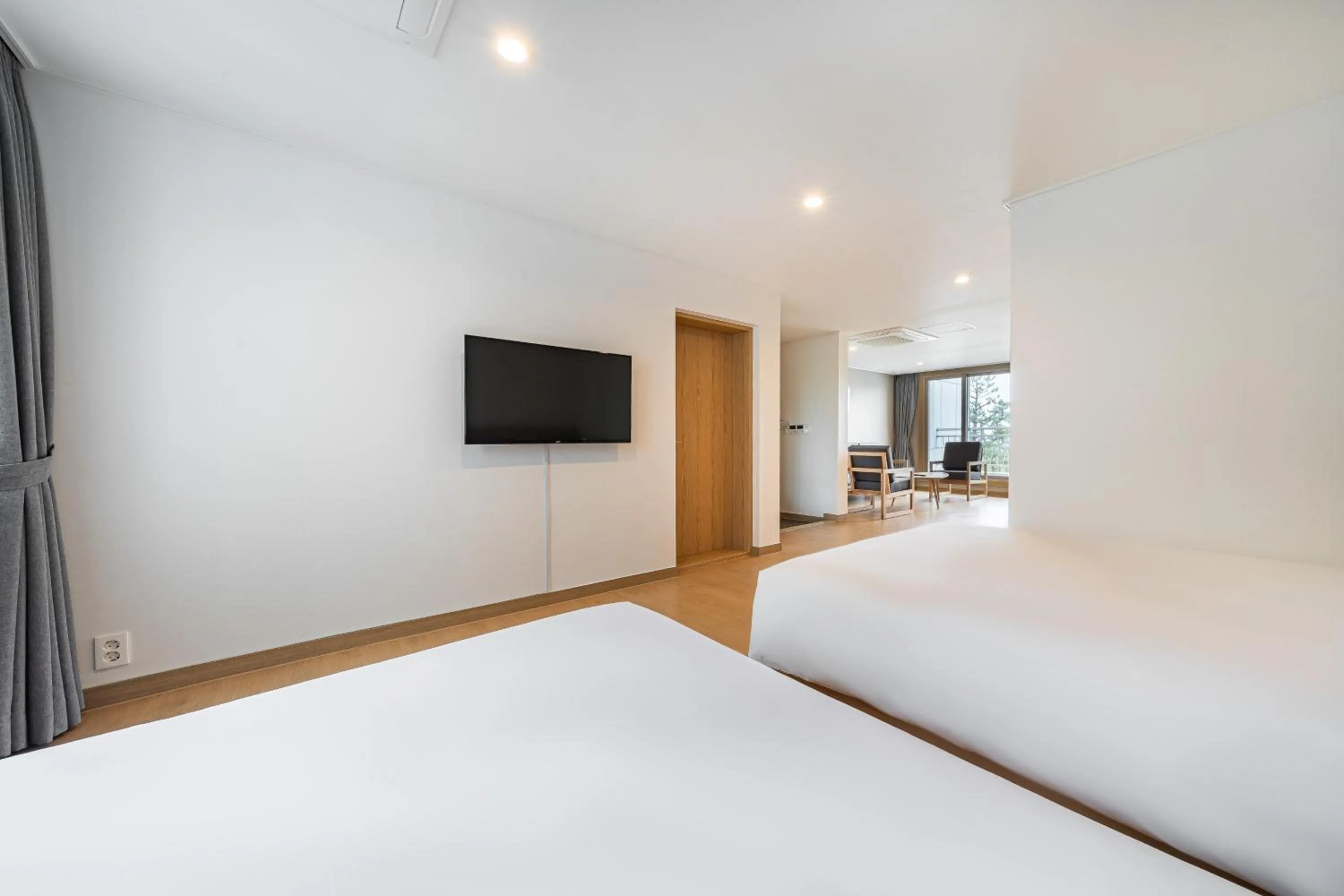 Bed in Heyy Seogwipo Hotel