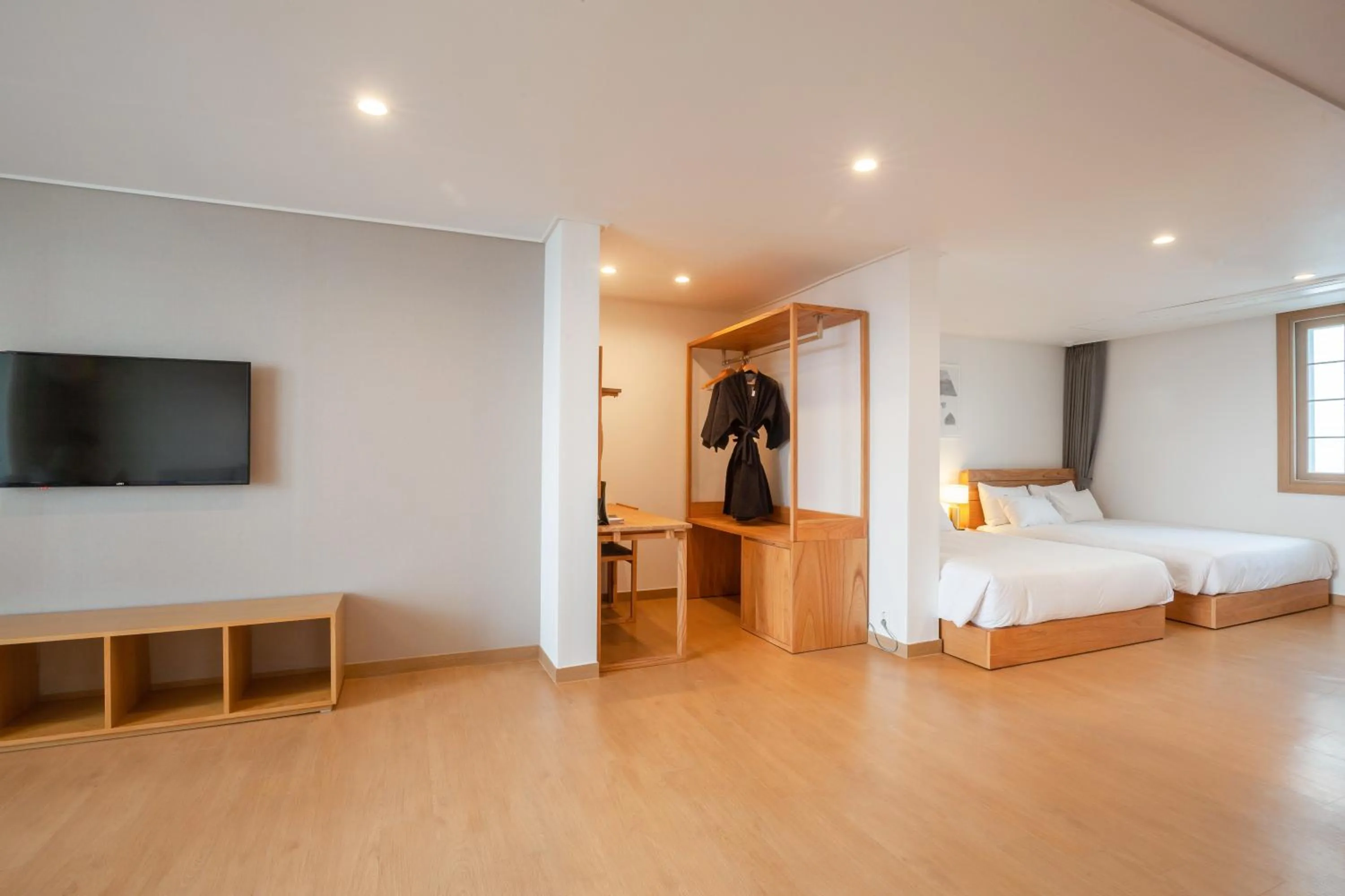 Bed in Heyy Seogwipo Hotel