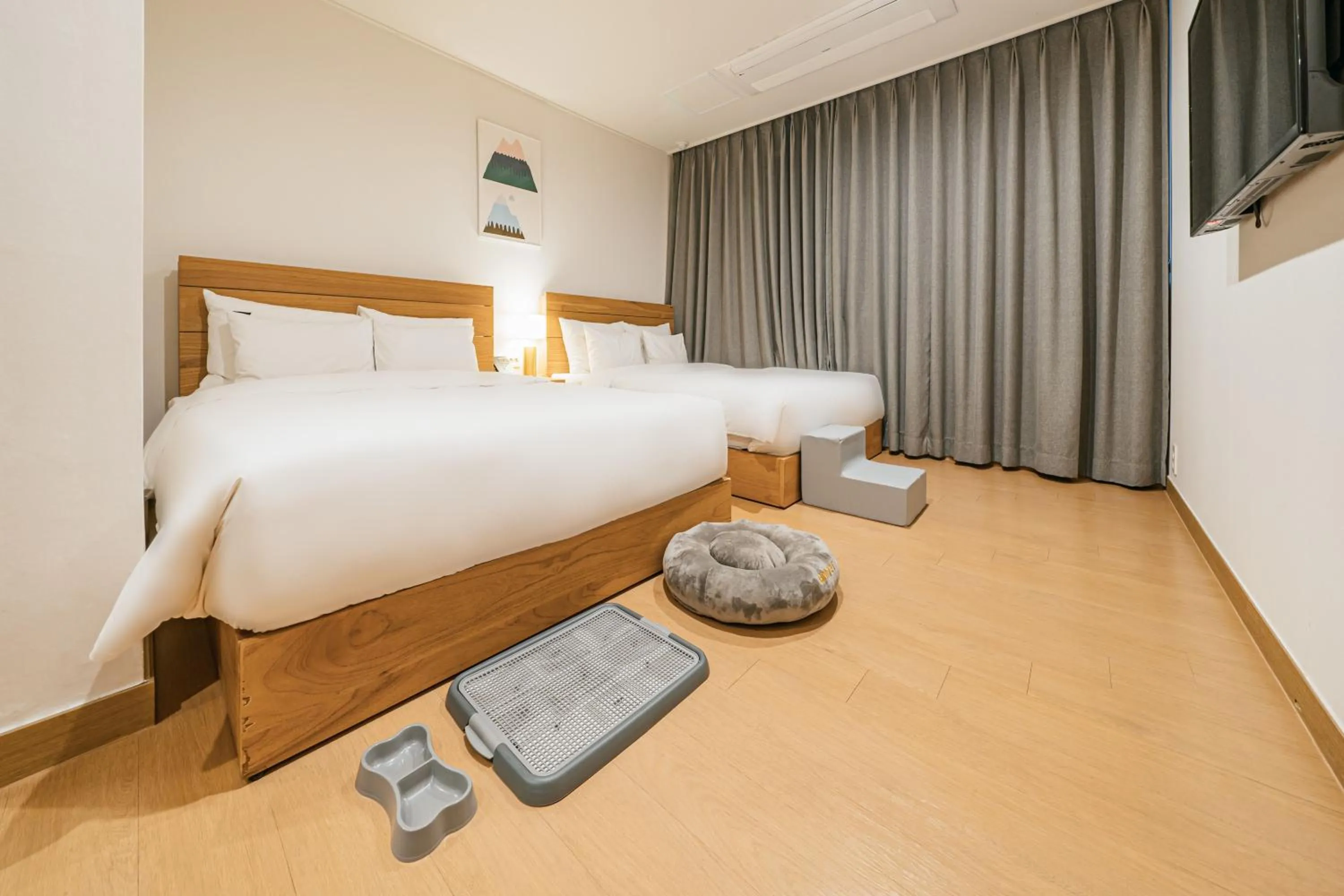 Bed in Heyy Seogwipo Hotel