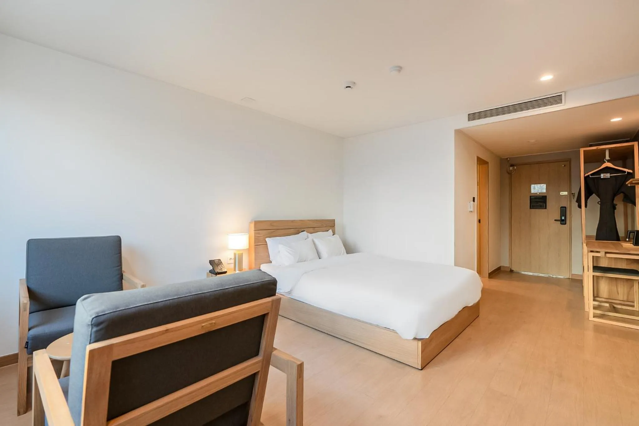 Bed in Heyy Seogwipo Hotel