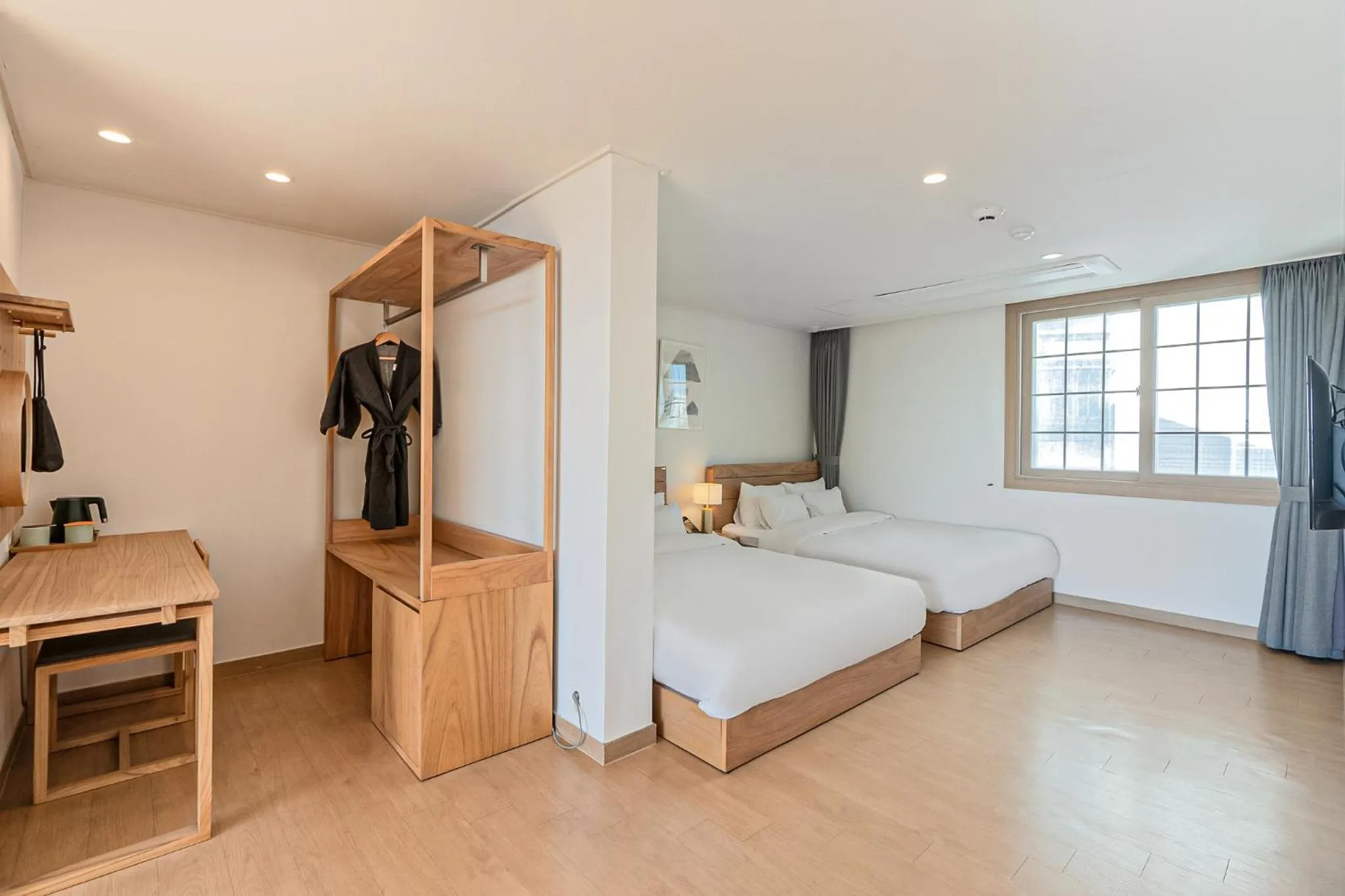 Bed in Heyy Seogwipo Hotel