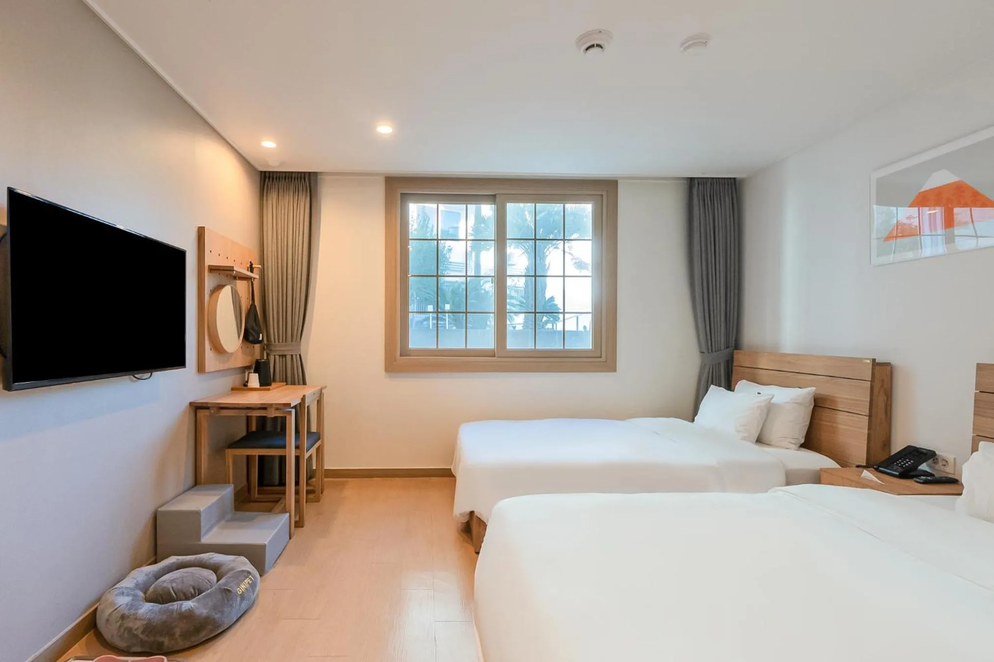 Bed in Heyy Seogwipo Hotel