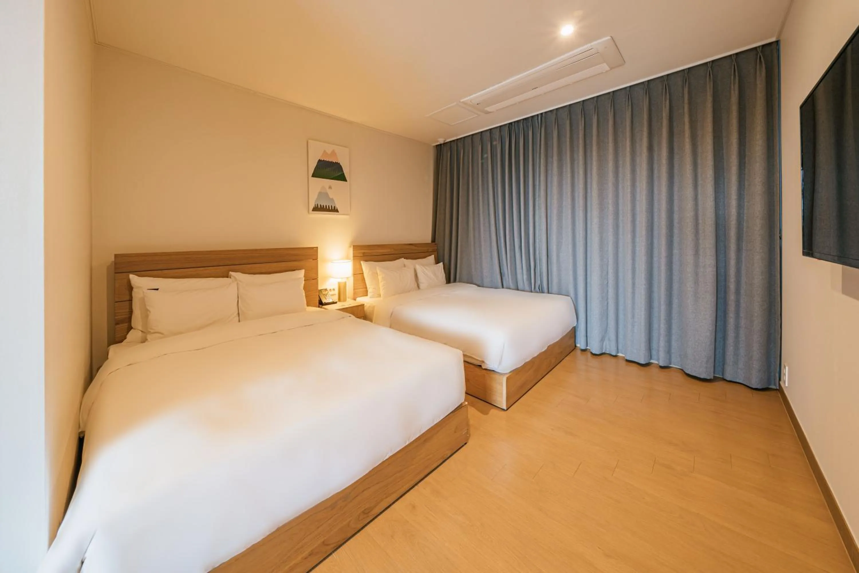 Bed in Heyy Seogwipo Hotel