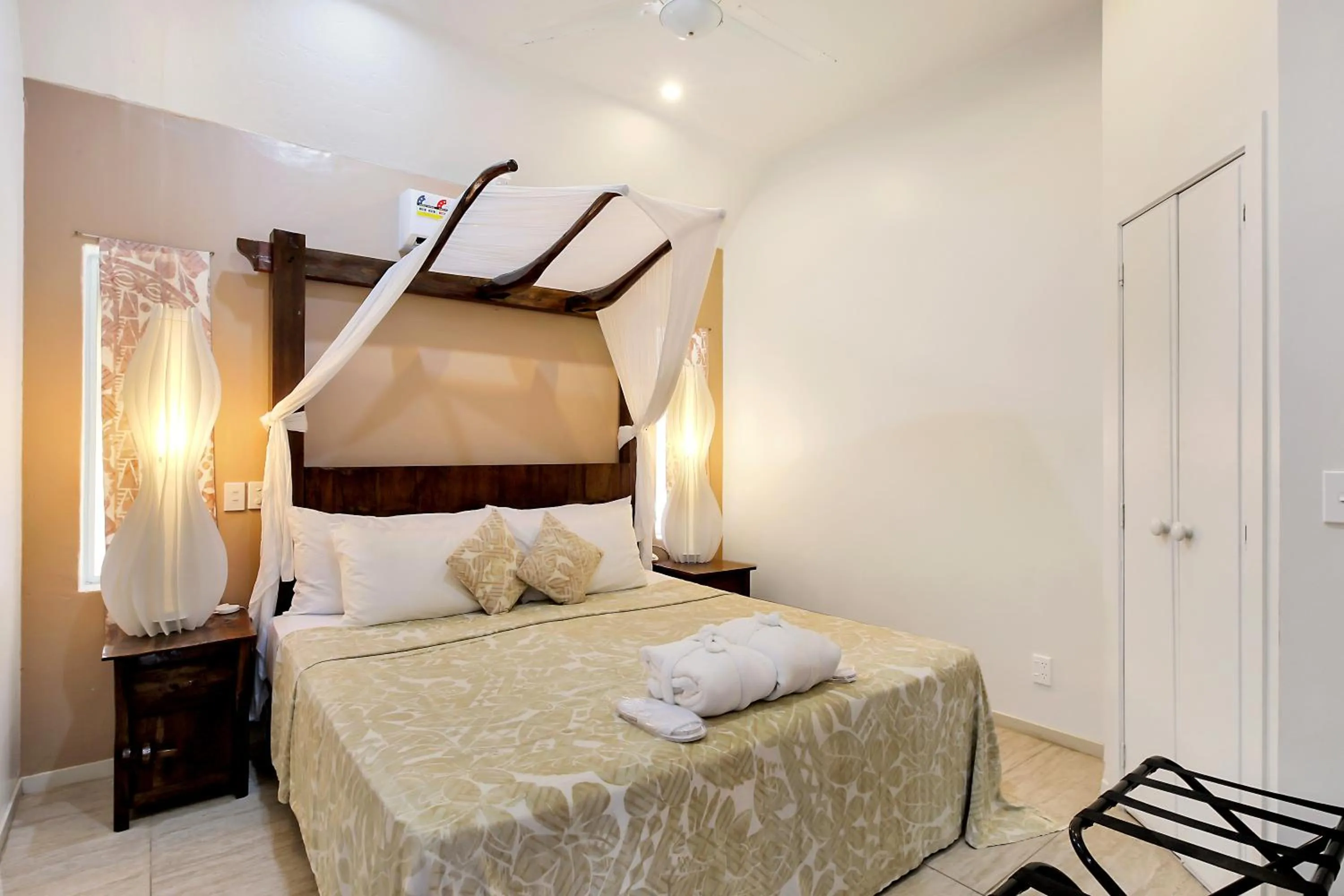 Bed in Crown Beach Resort & Spa