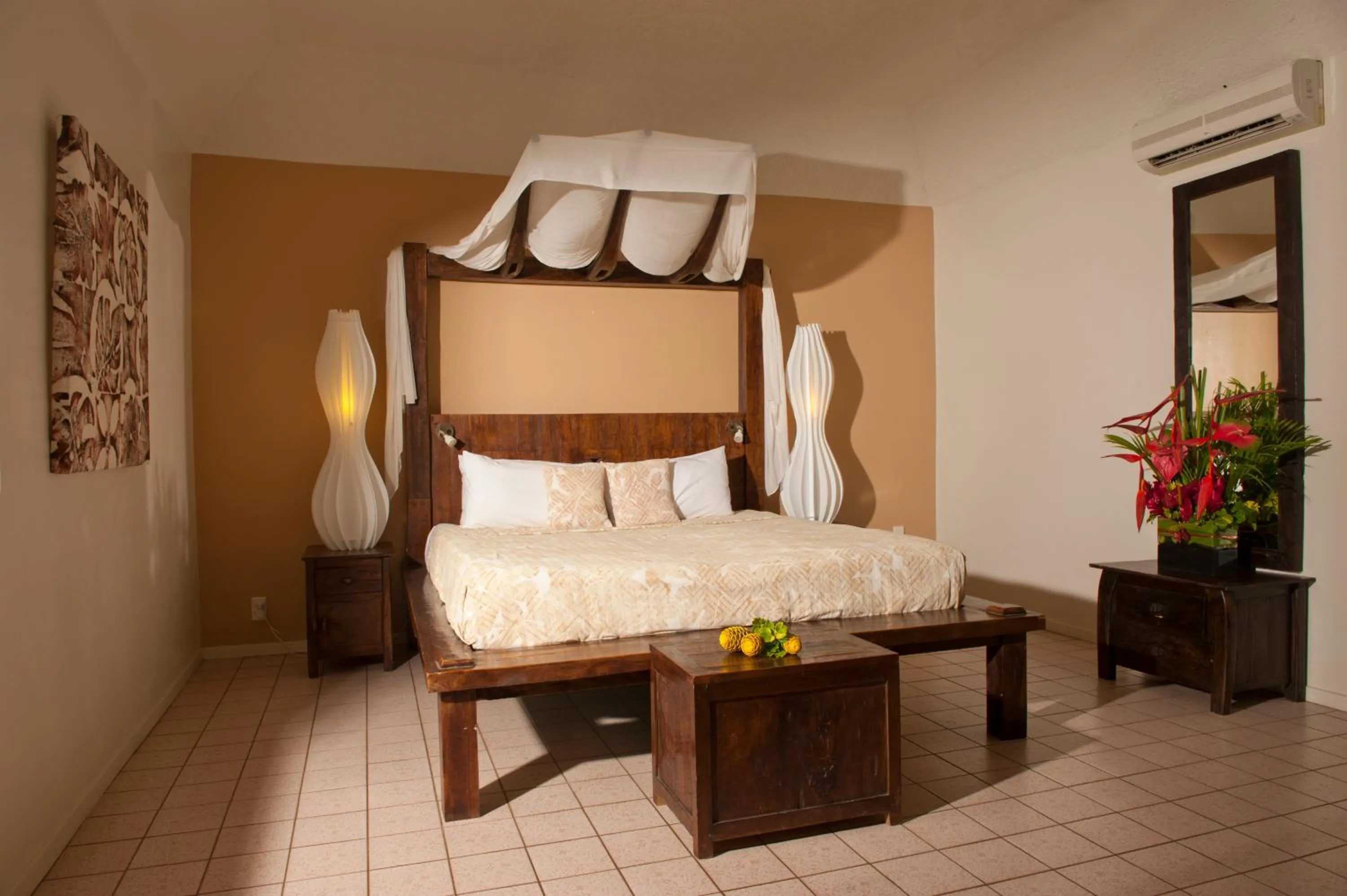 Bed in Crown Beach Resort & Spa