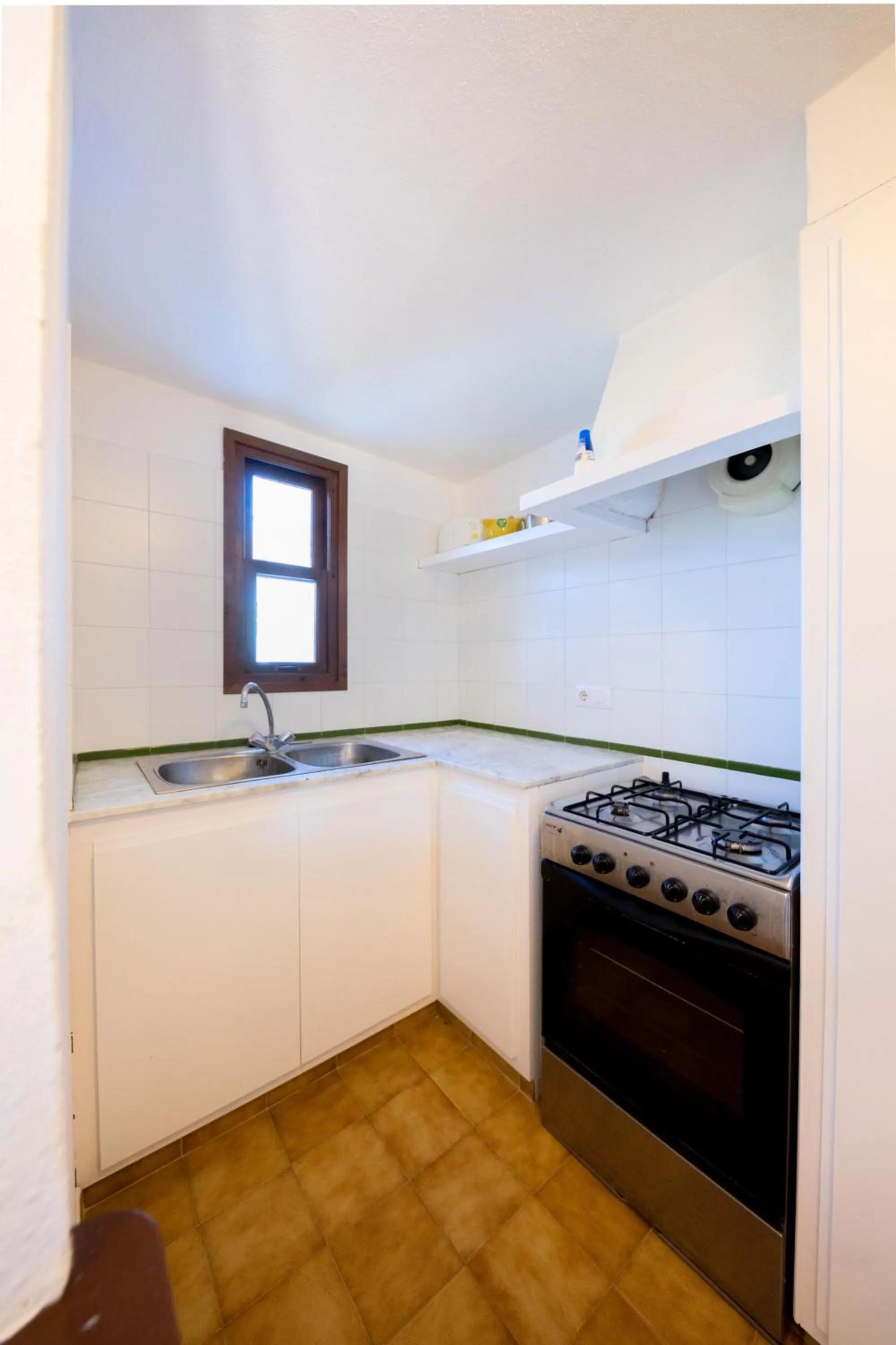 Kitchen or kitchenette in Apartamentos Sa Cornisa