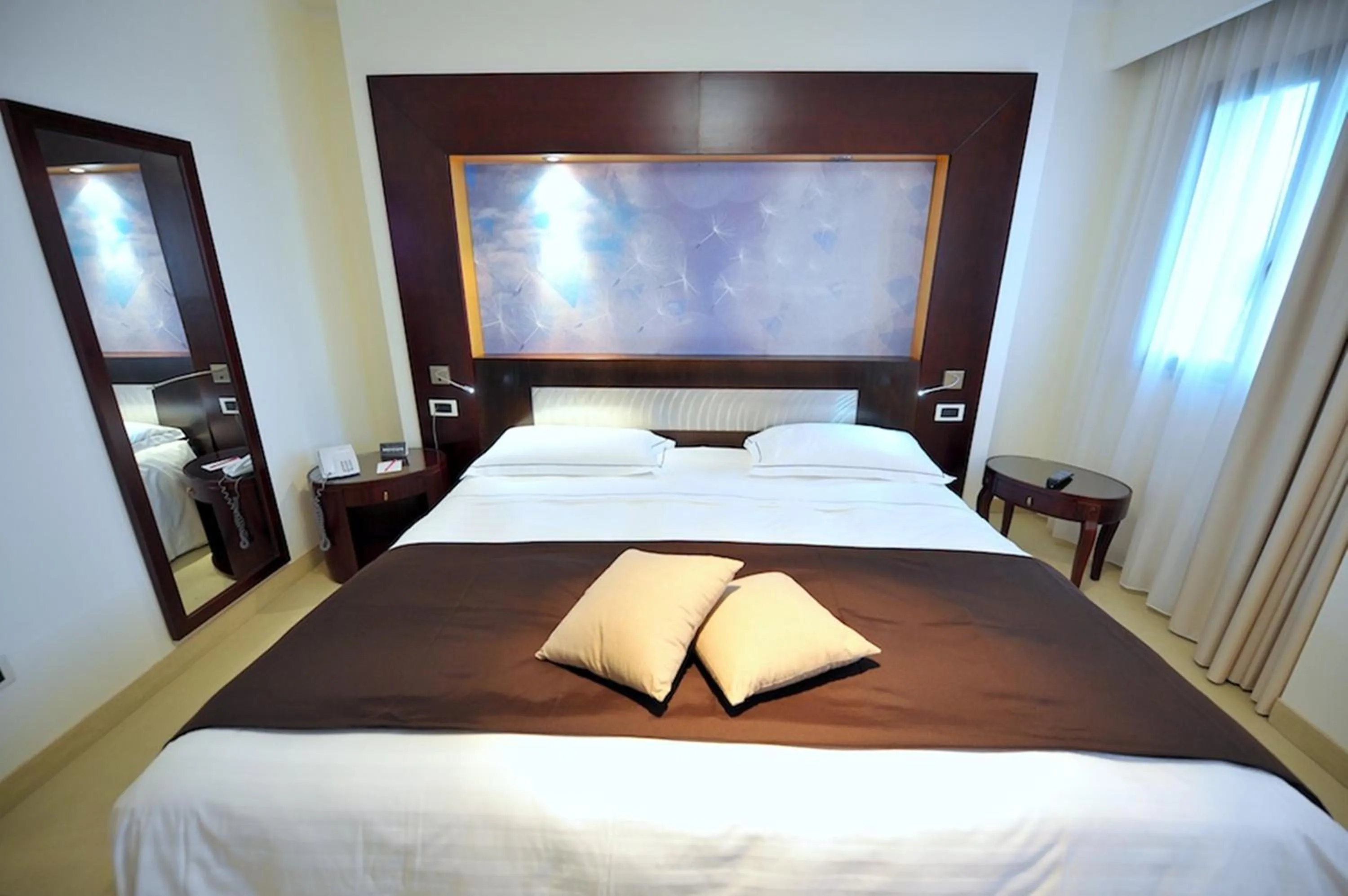 Photo of the whole room, Bed in Mercure Olbia