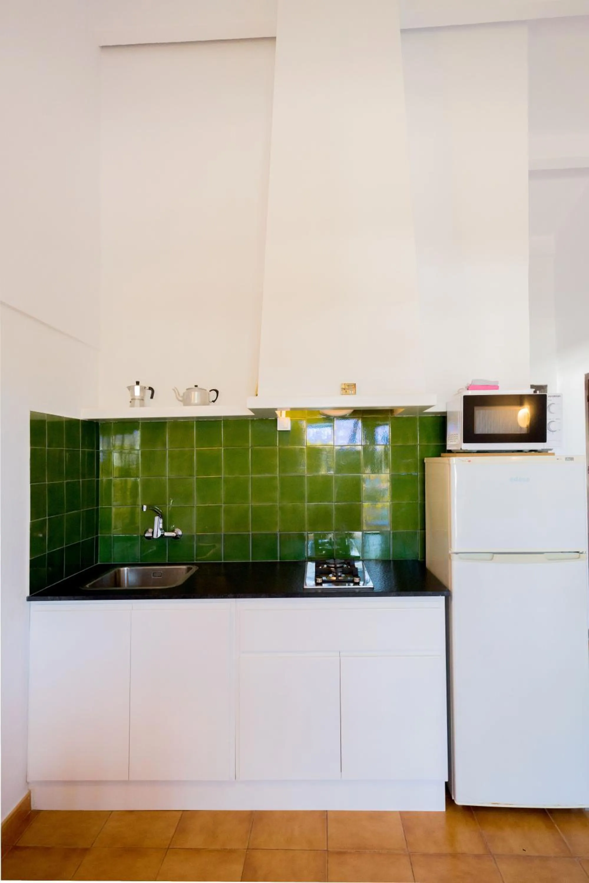Kitchen or kitchenette in Apartamentos Sa Cala