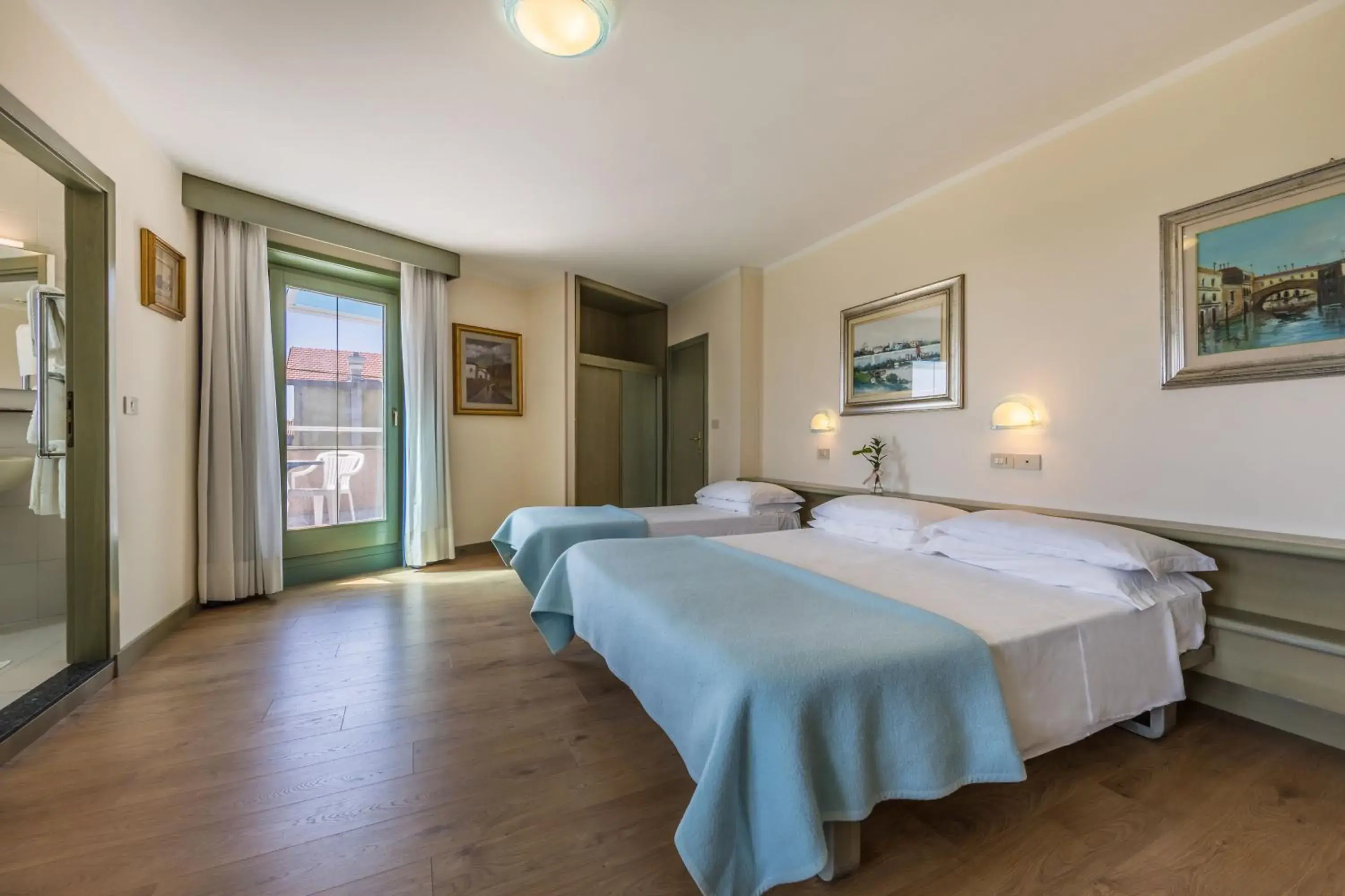 Triple Room in Aviano Palace Hotel Triple Room in Aviano Palace Hotel